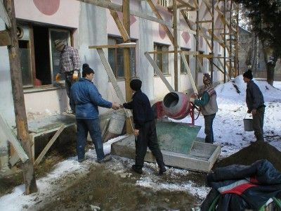 The renovation begun. The young boy in black is Gabi Cazan, our present children’s pastor. He started of as a construction worker and God led him to become a worker on children’s souls.