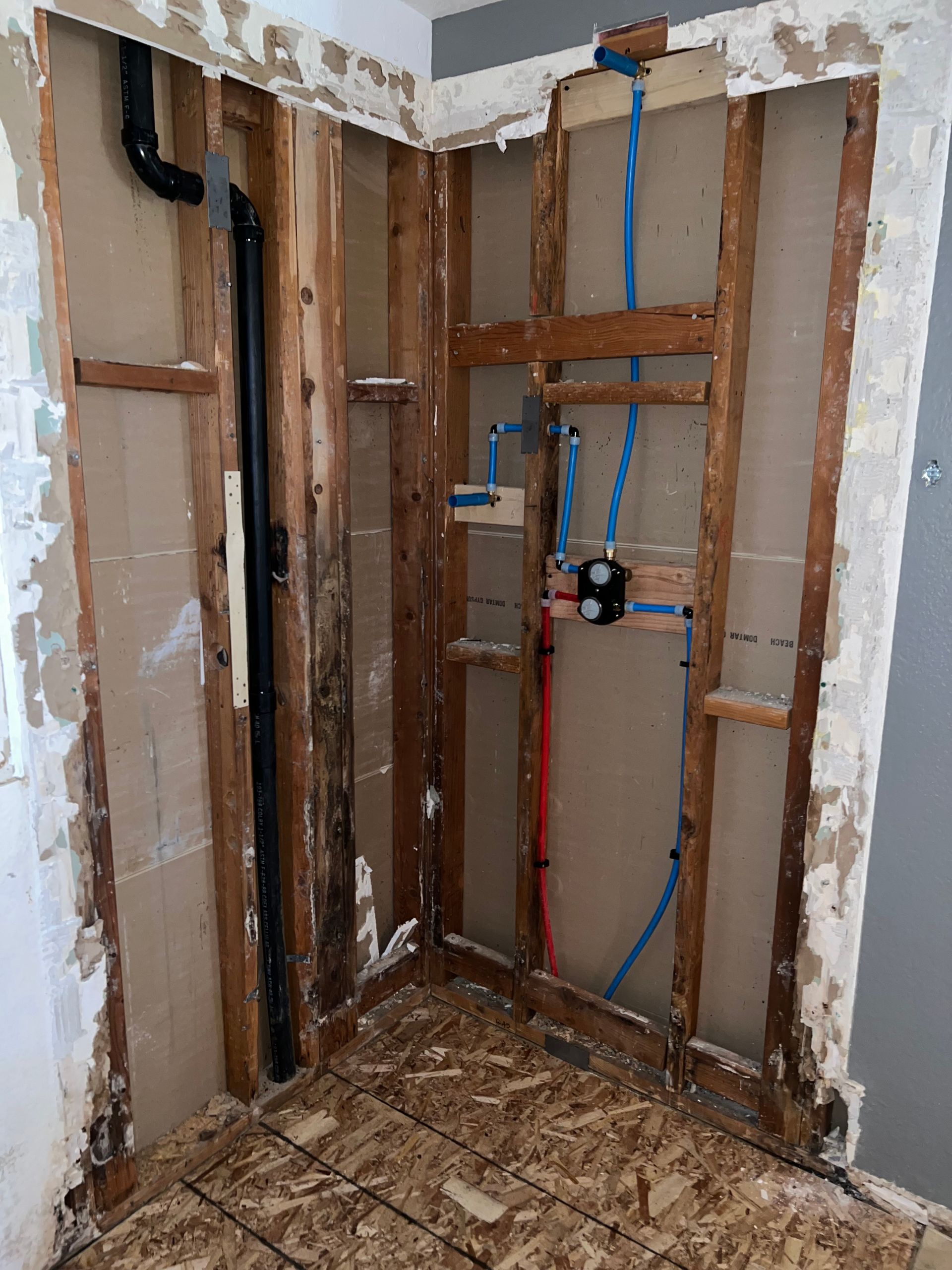A bathroom is being remodeled and the walls are being removed.