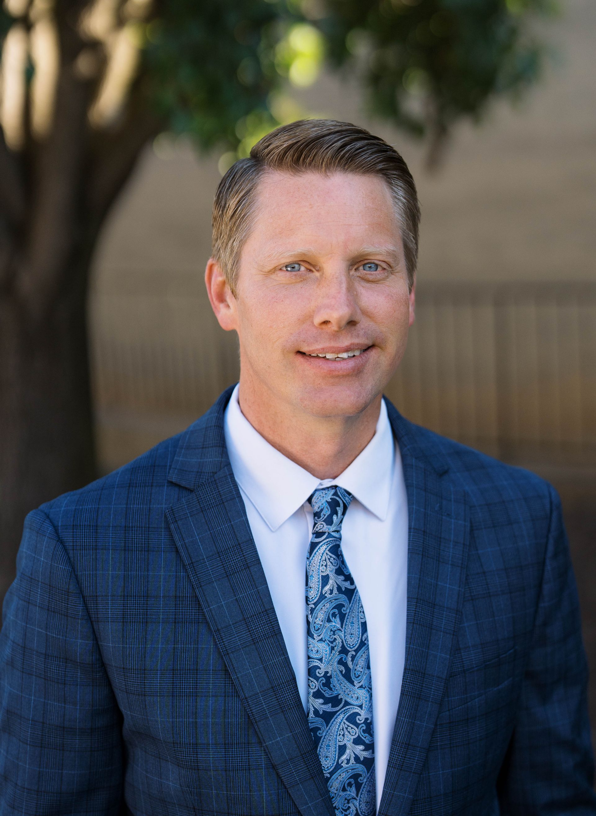 A silhouette of a person without a face on a white background.
