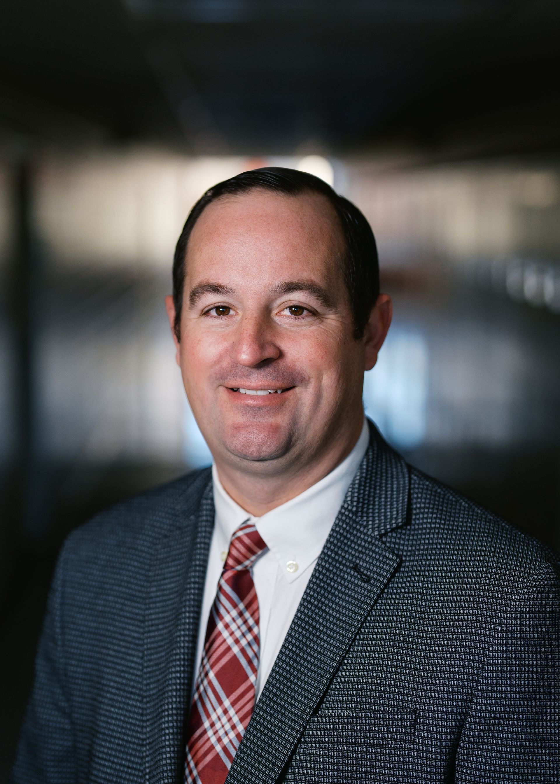 A silhouette of a person without a face on a white background.