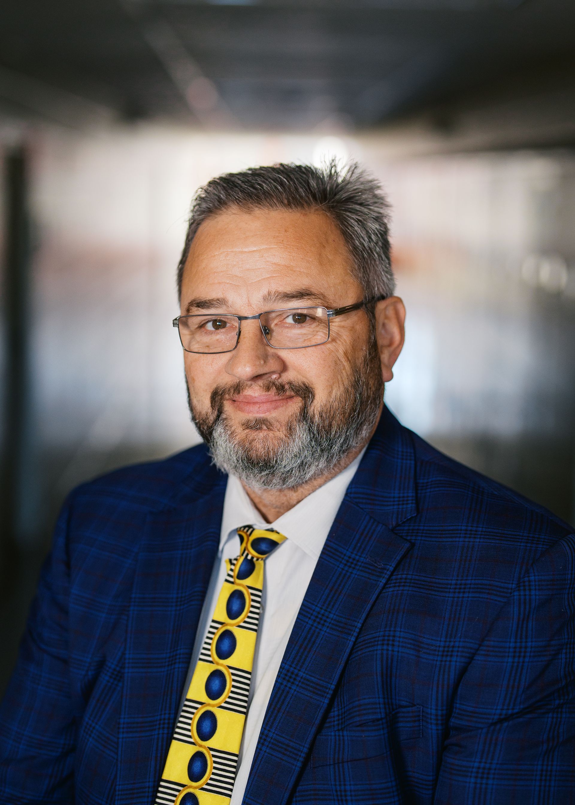 A silhouette of a person without a face on a white background.