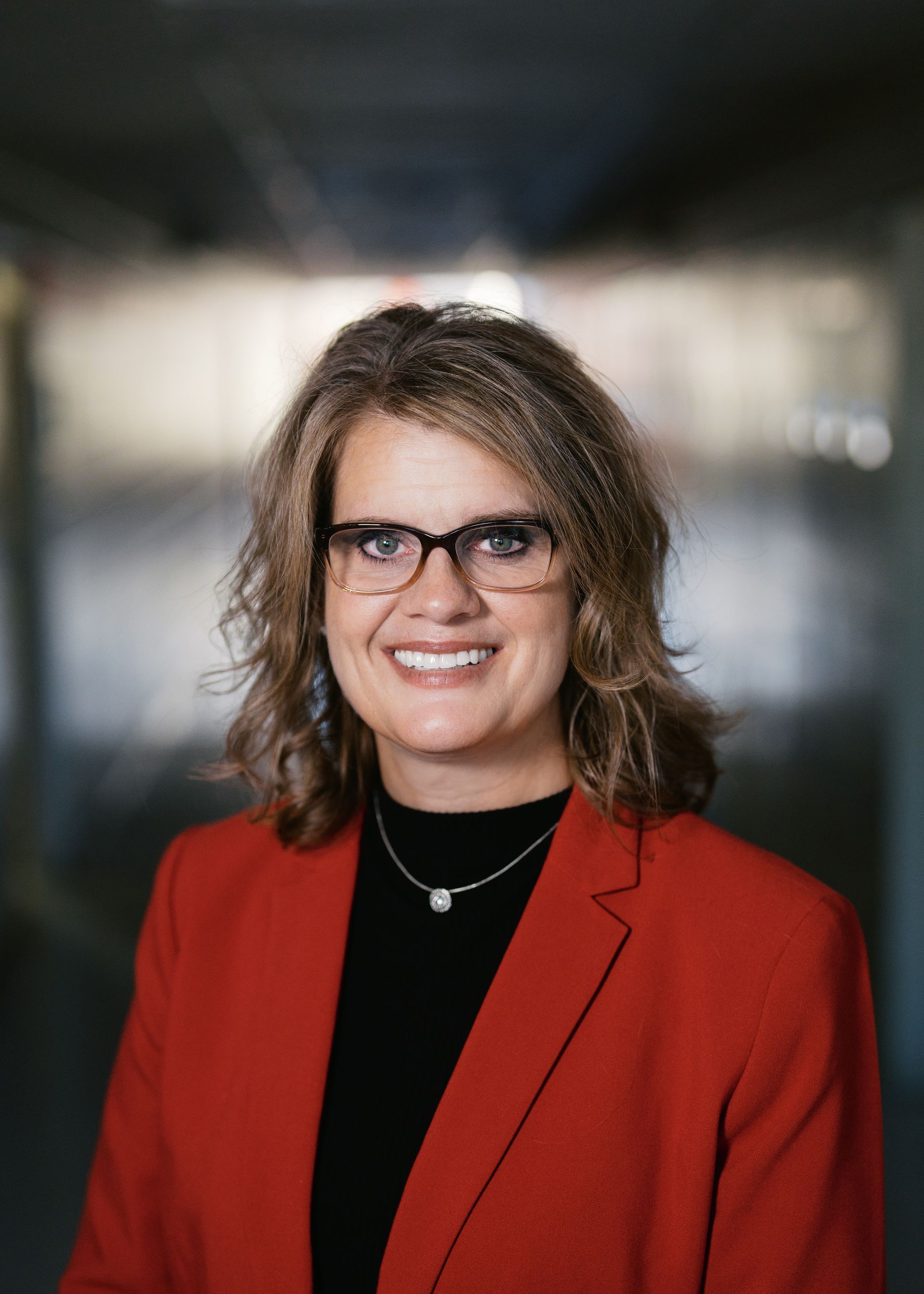 A silhouette of a person without a face on a white background.
