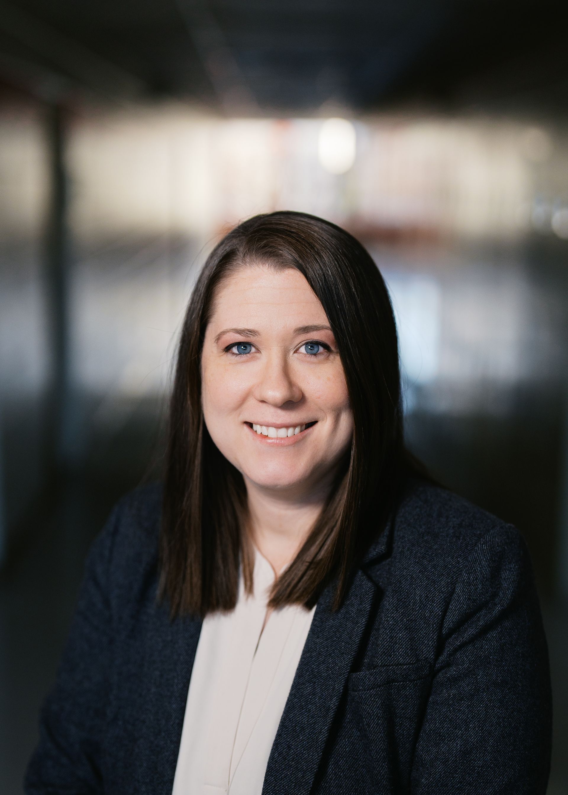 A silhouette of a person without a face on a white background.