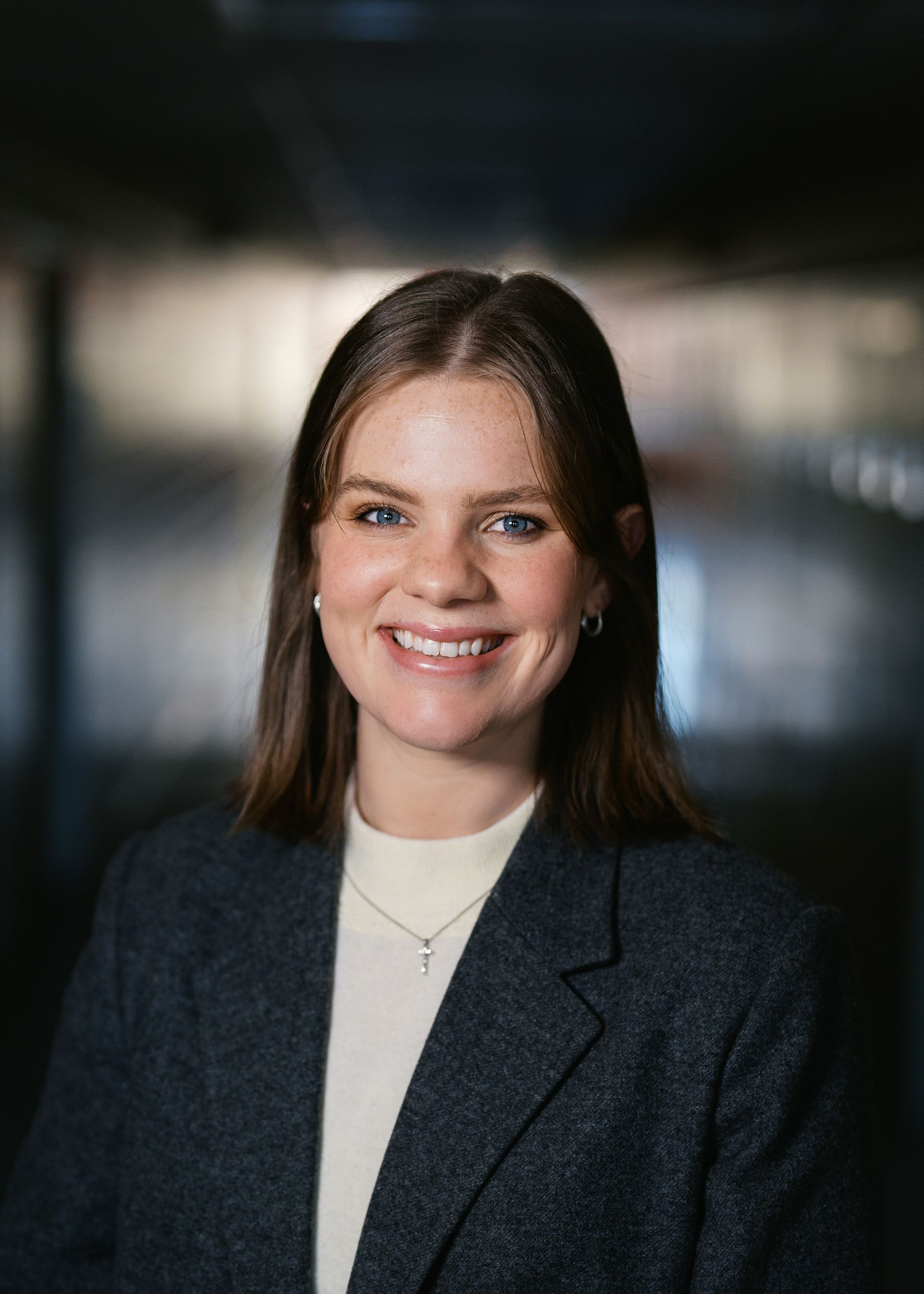 A silhouette of a person without a face on a white background.