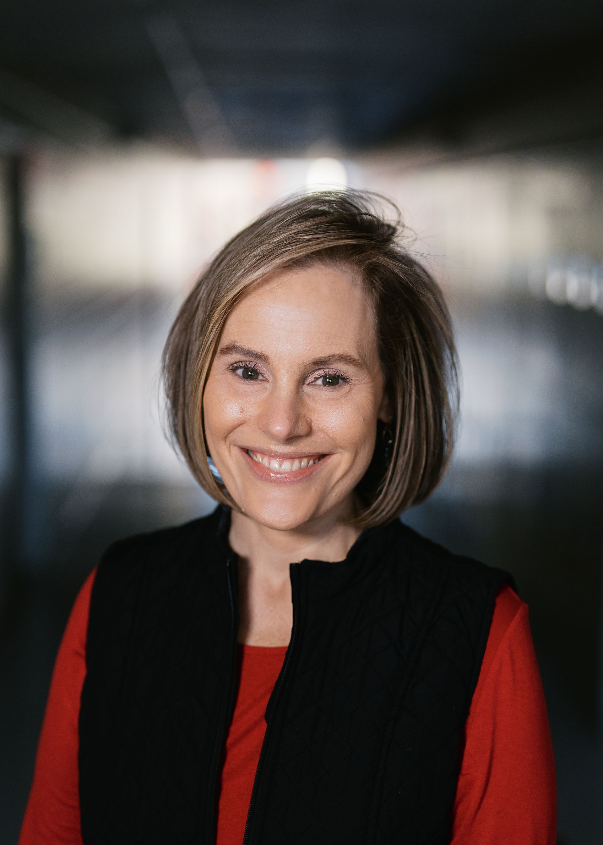 A silhouette of a person without a face on a white background.