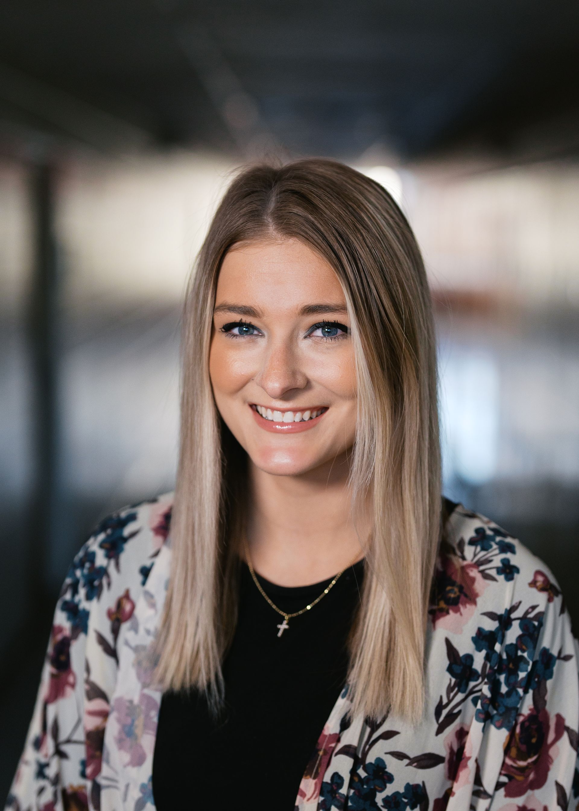 A silhouette of a person without a face on a white background.