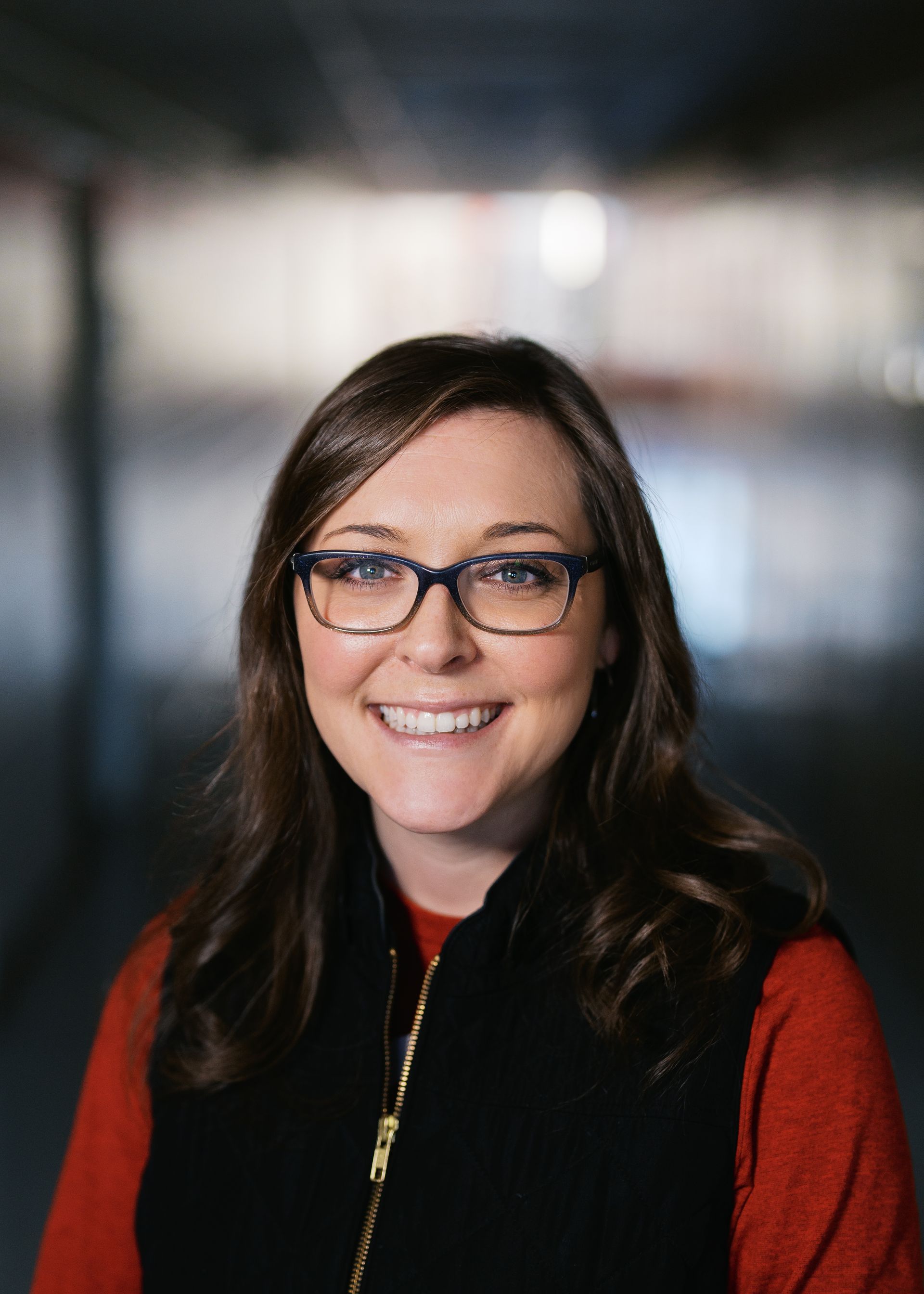 A silhouette of a person without a face on a white background.