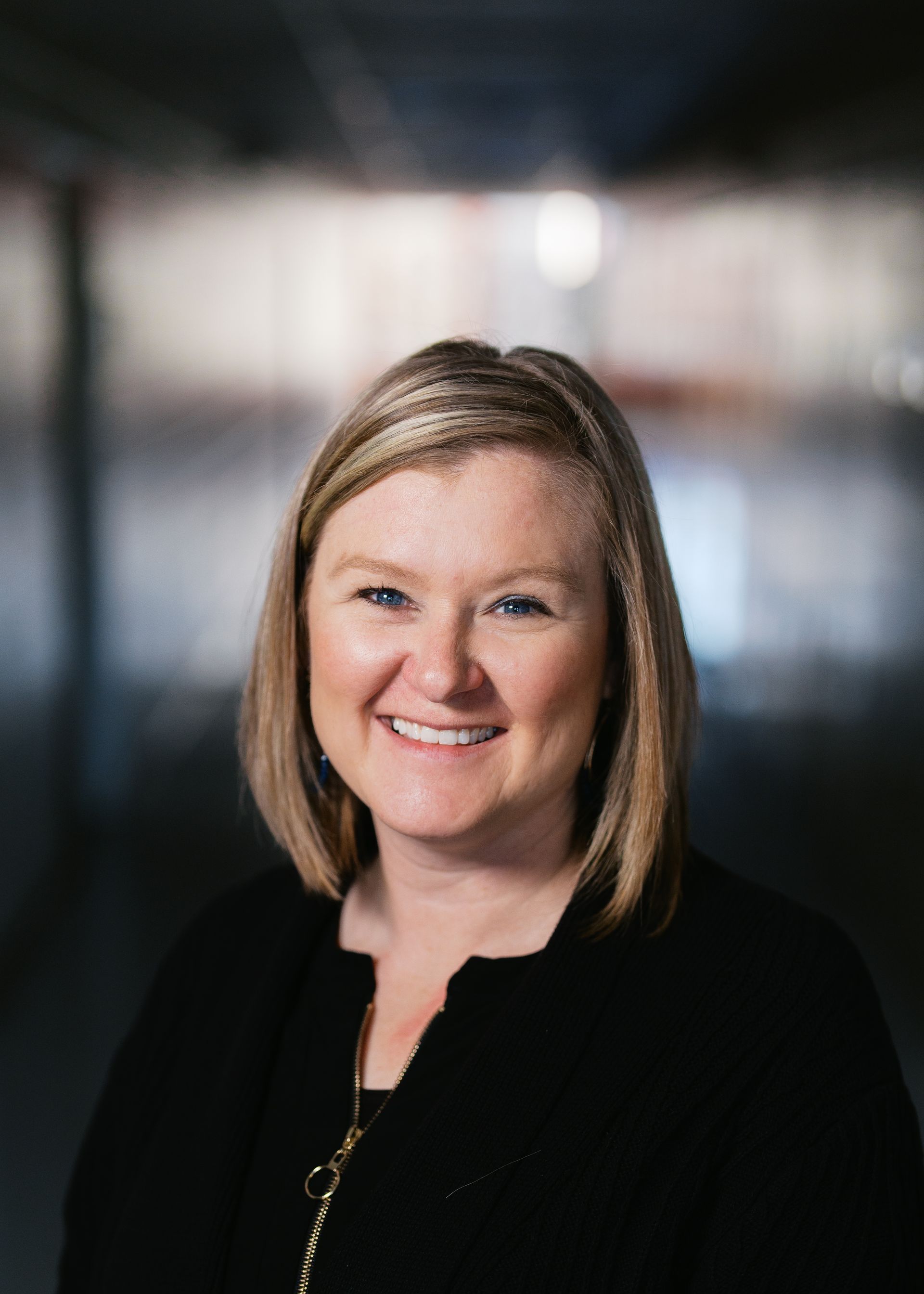 A silhouette of a person without a face on a white background.