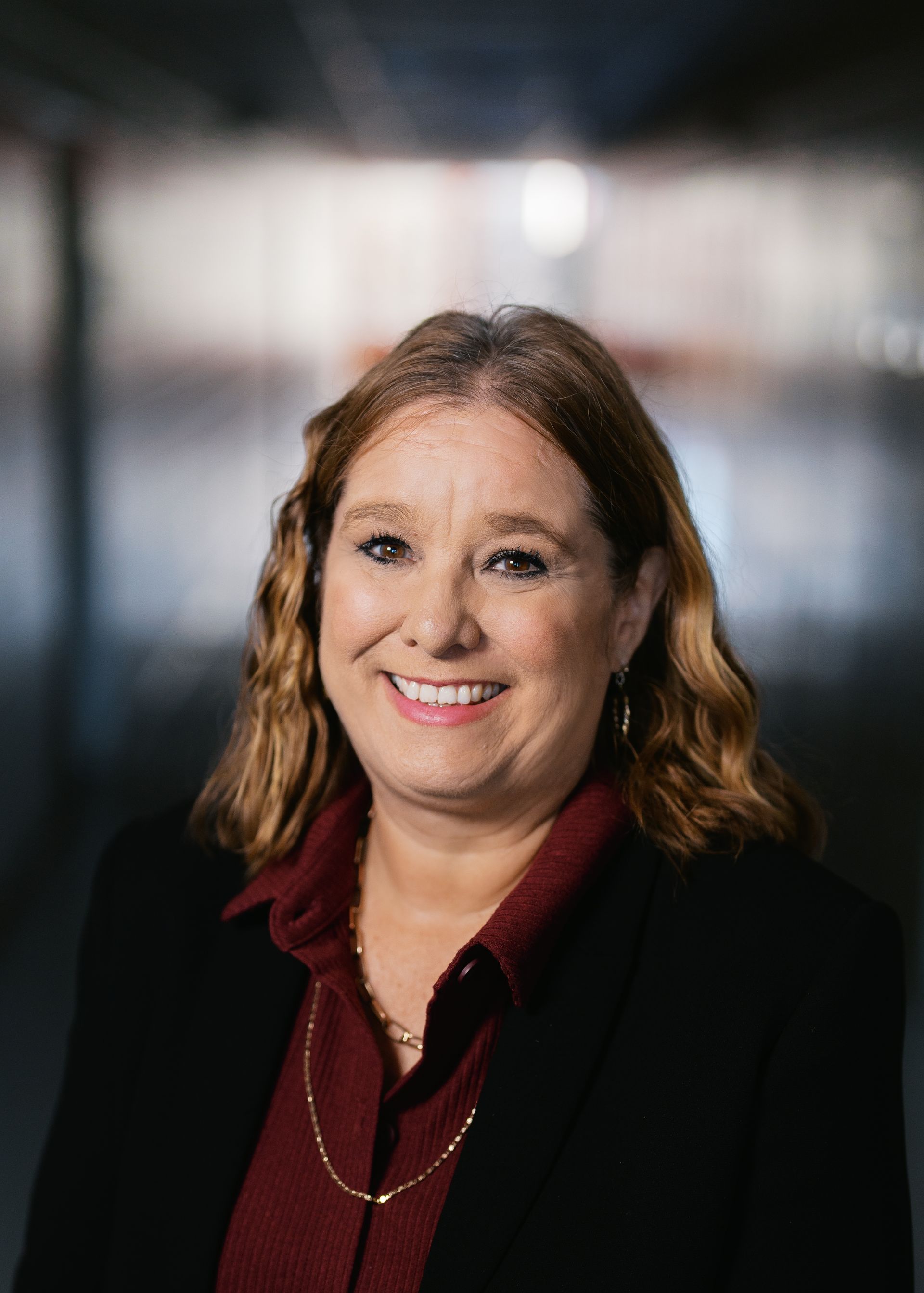 A silhouette of a person without a face on a white background.