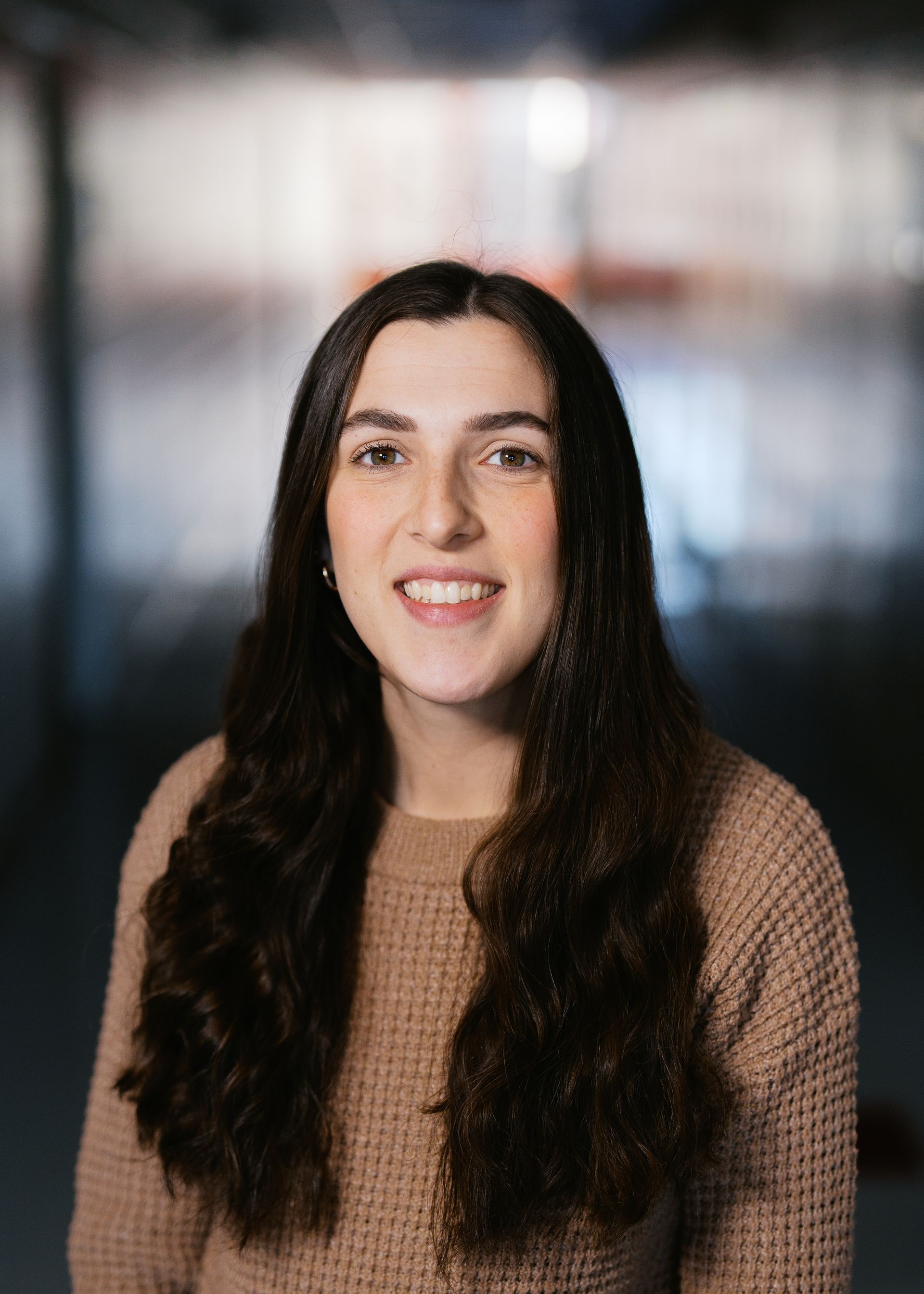 A silhouette of a person without a face on a white background.