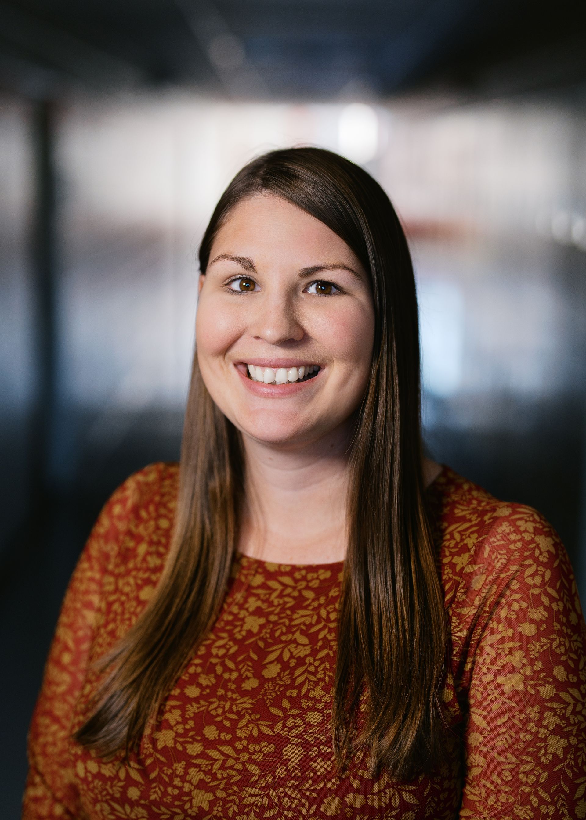 A silhouette of a person without a face on a white background.