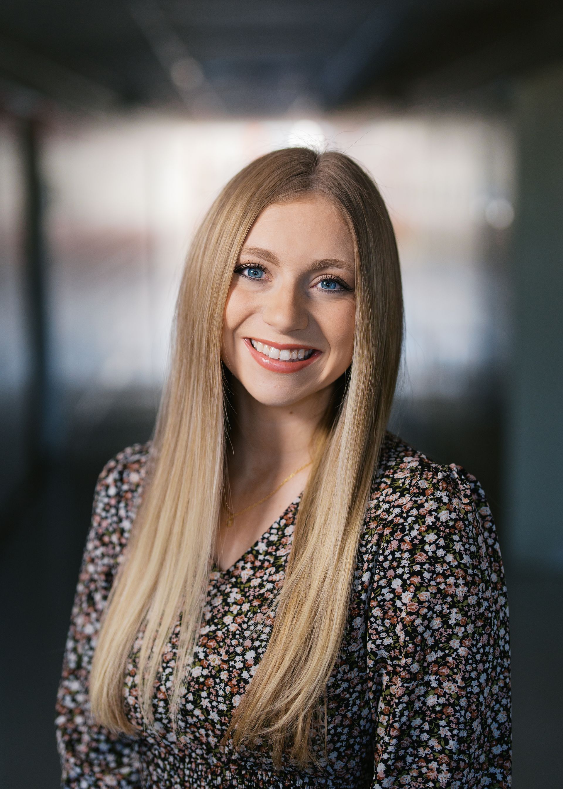 A silhouette of a person without a face on a white background.