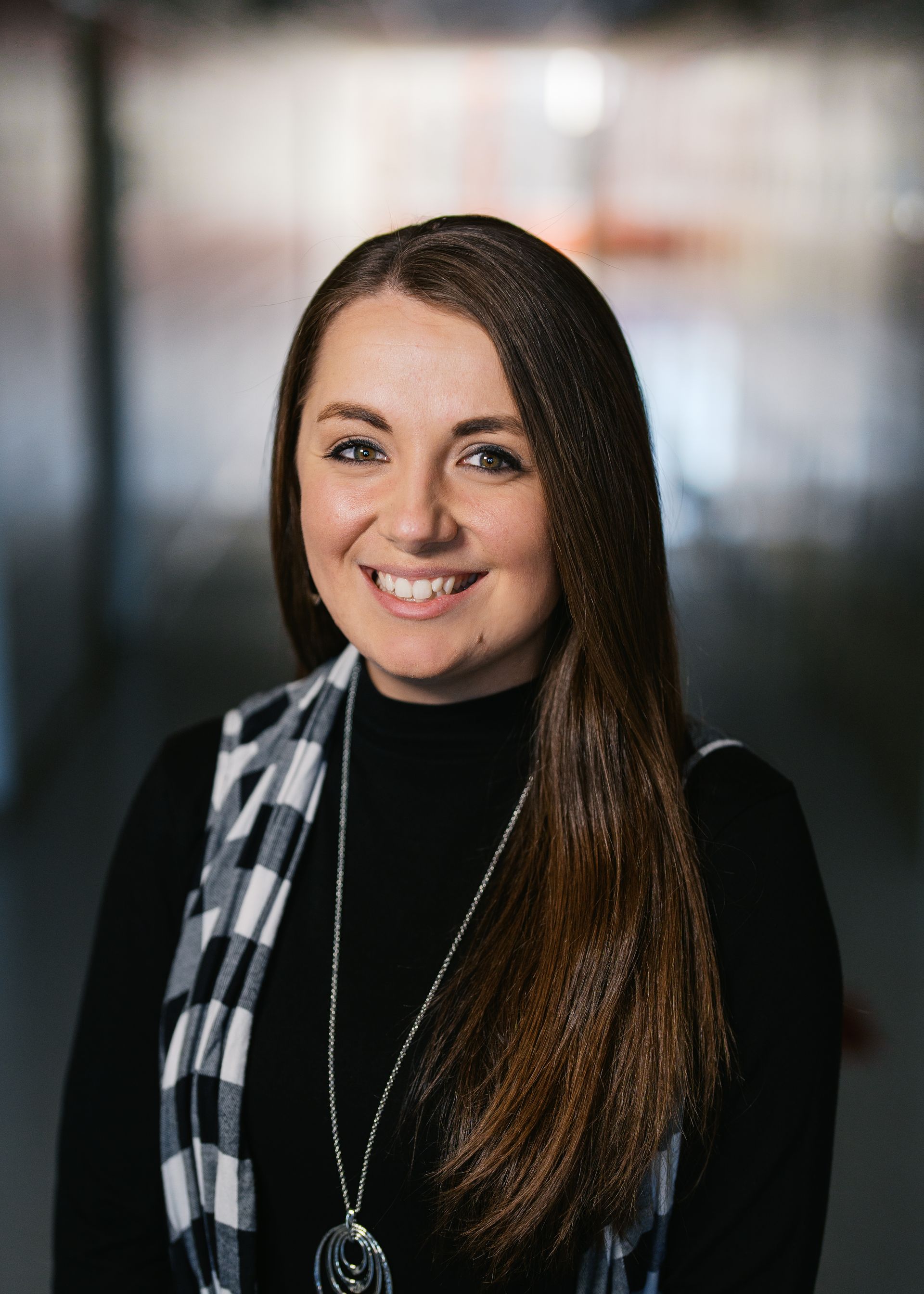 A silhouette of a person without a face on a white background.