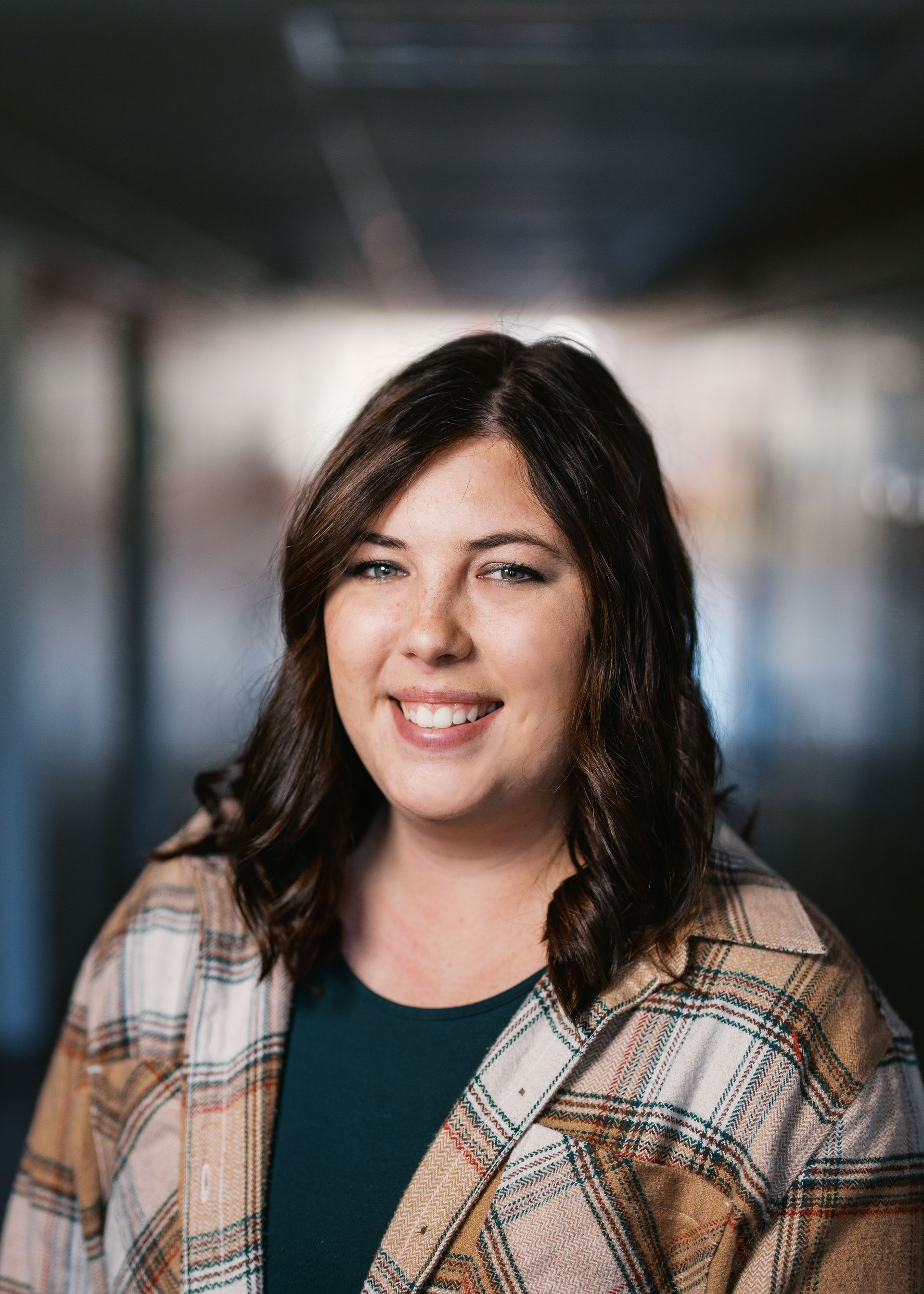 A silhouette of a person without a face on a white background.