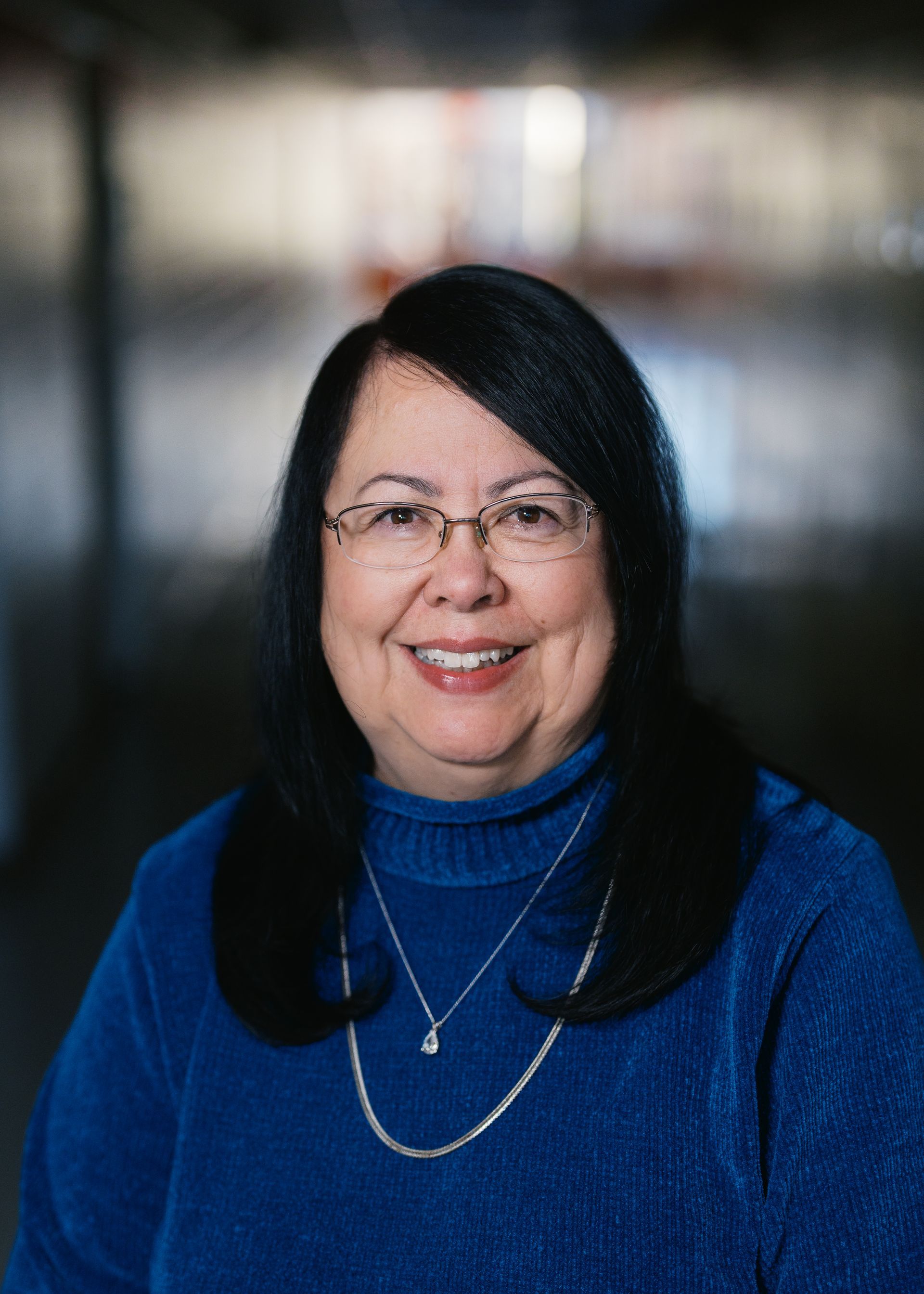 A silhouette of a person without a face on a white background.