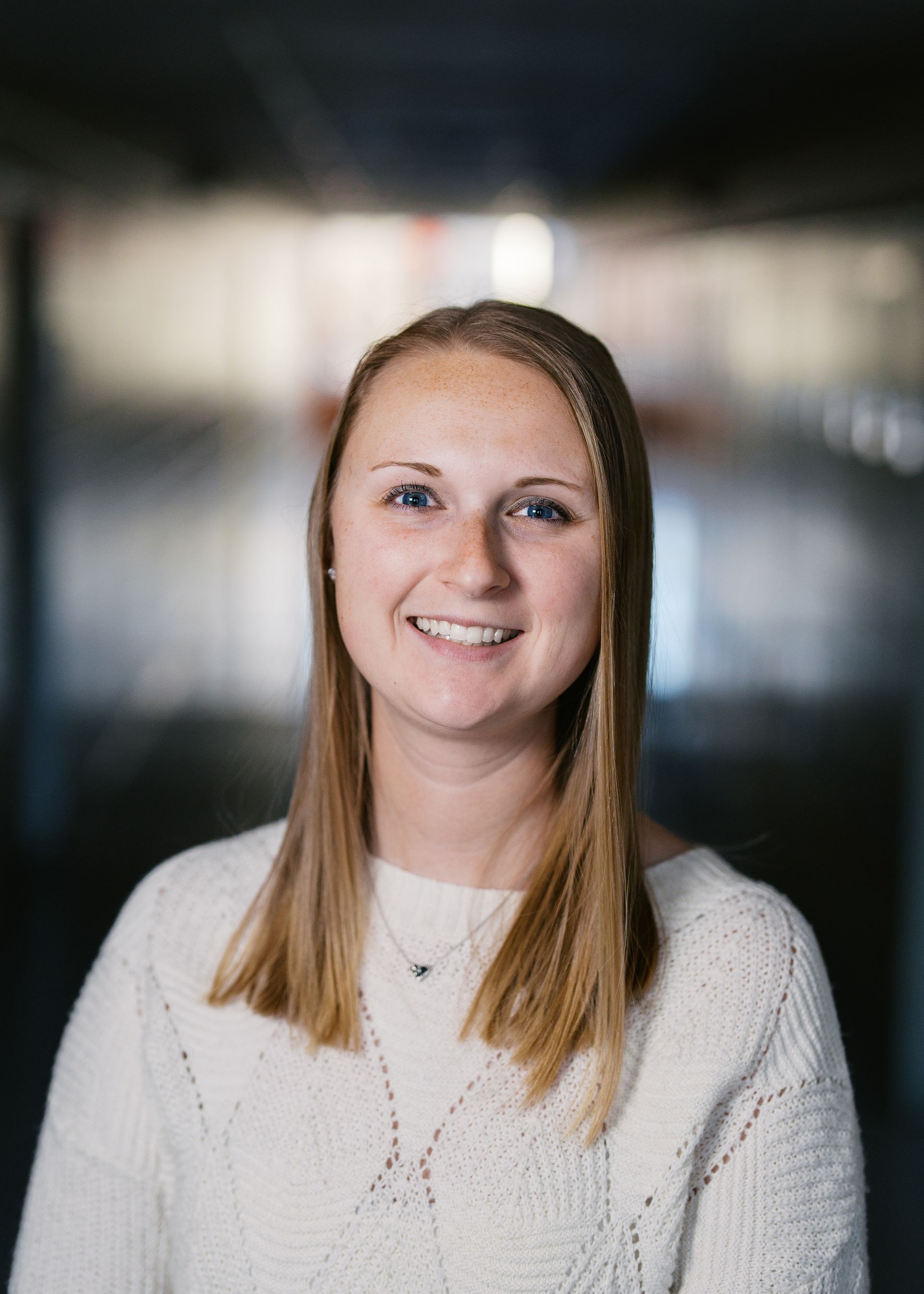 A silhouette of a person without a face on a white background.