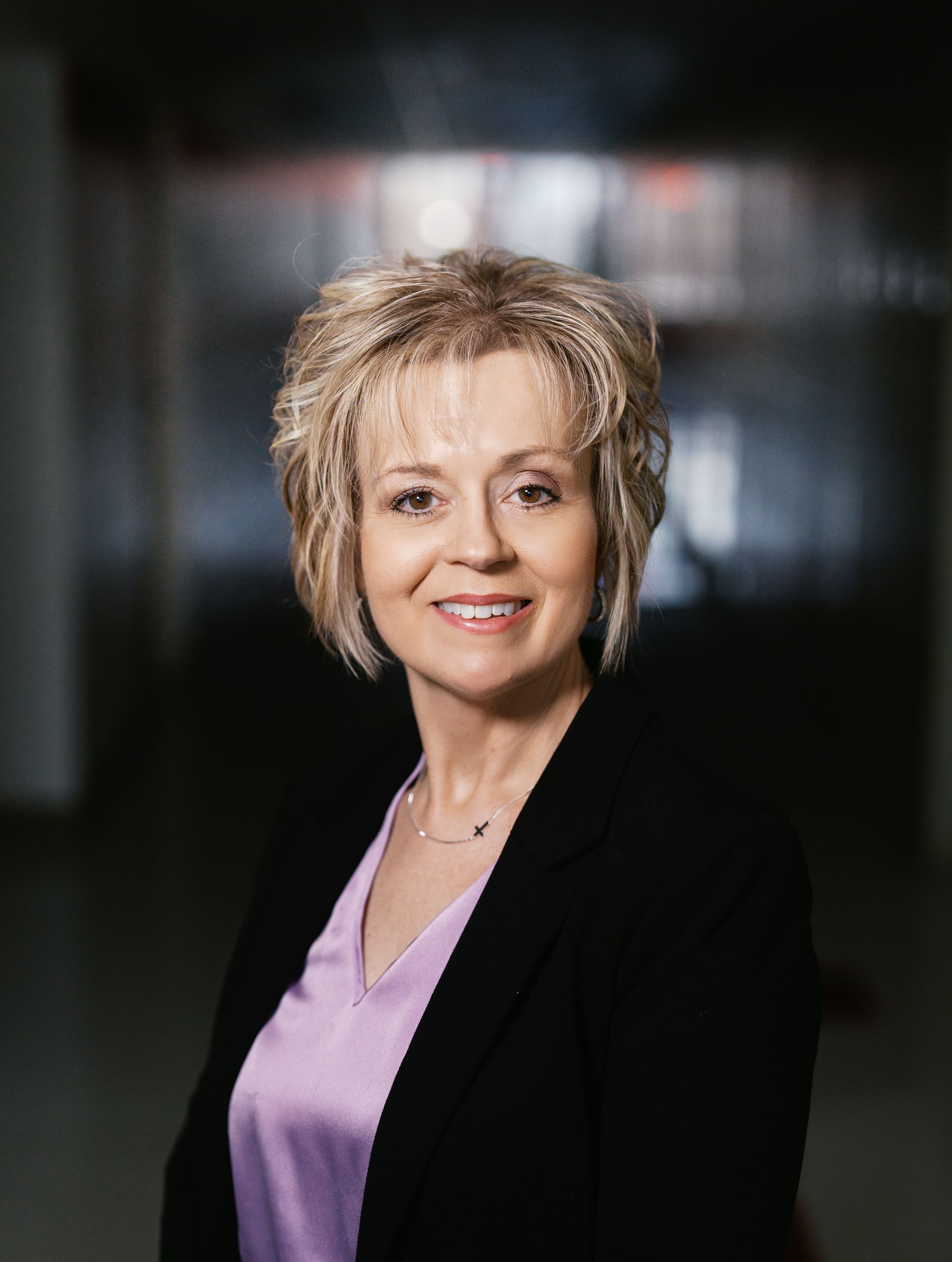 A silhouette of a person without a face on a white background.