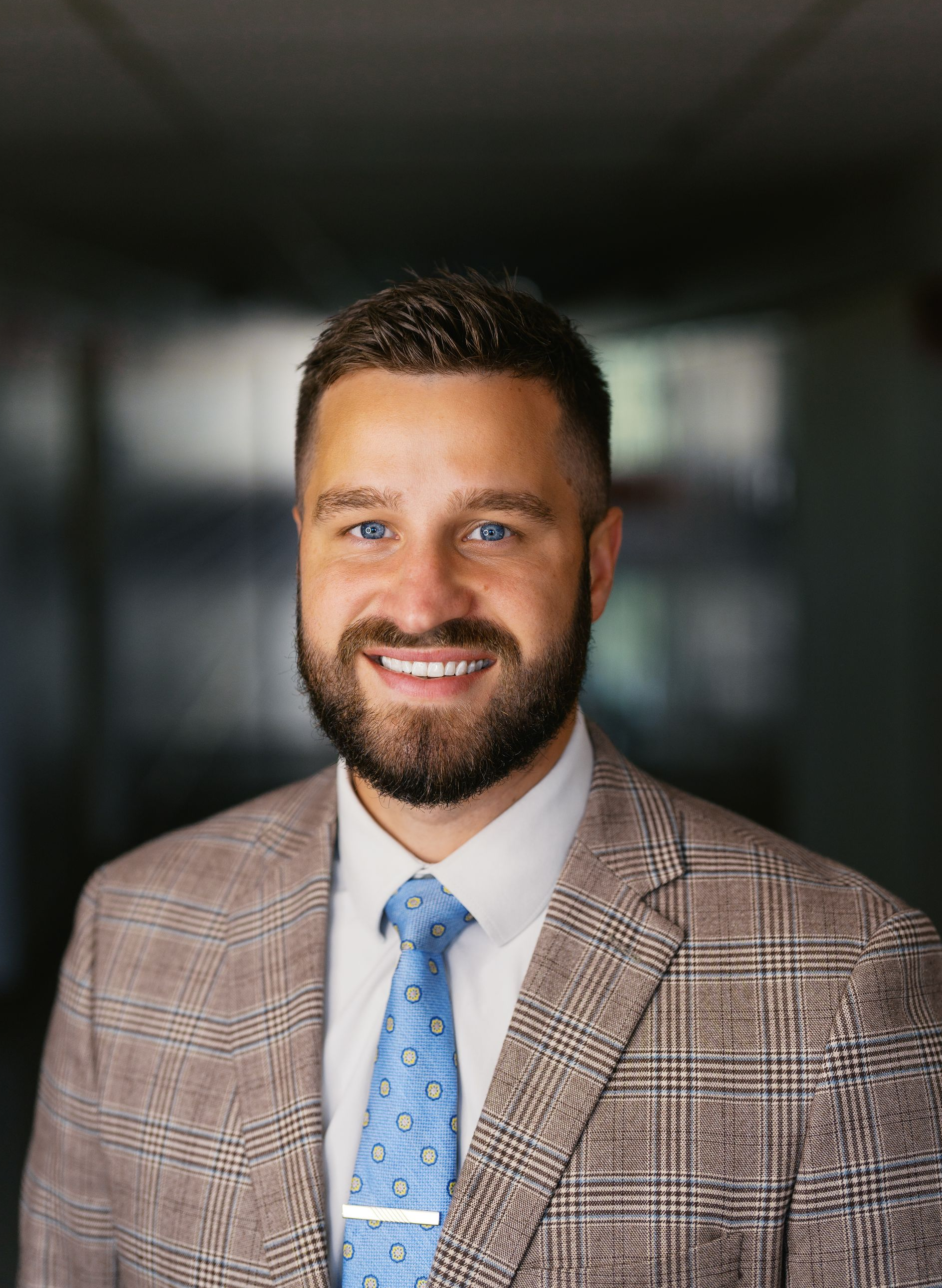 A silhouette of a person without a face on a white background.