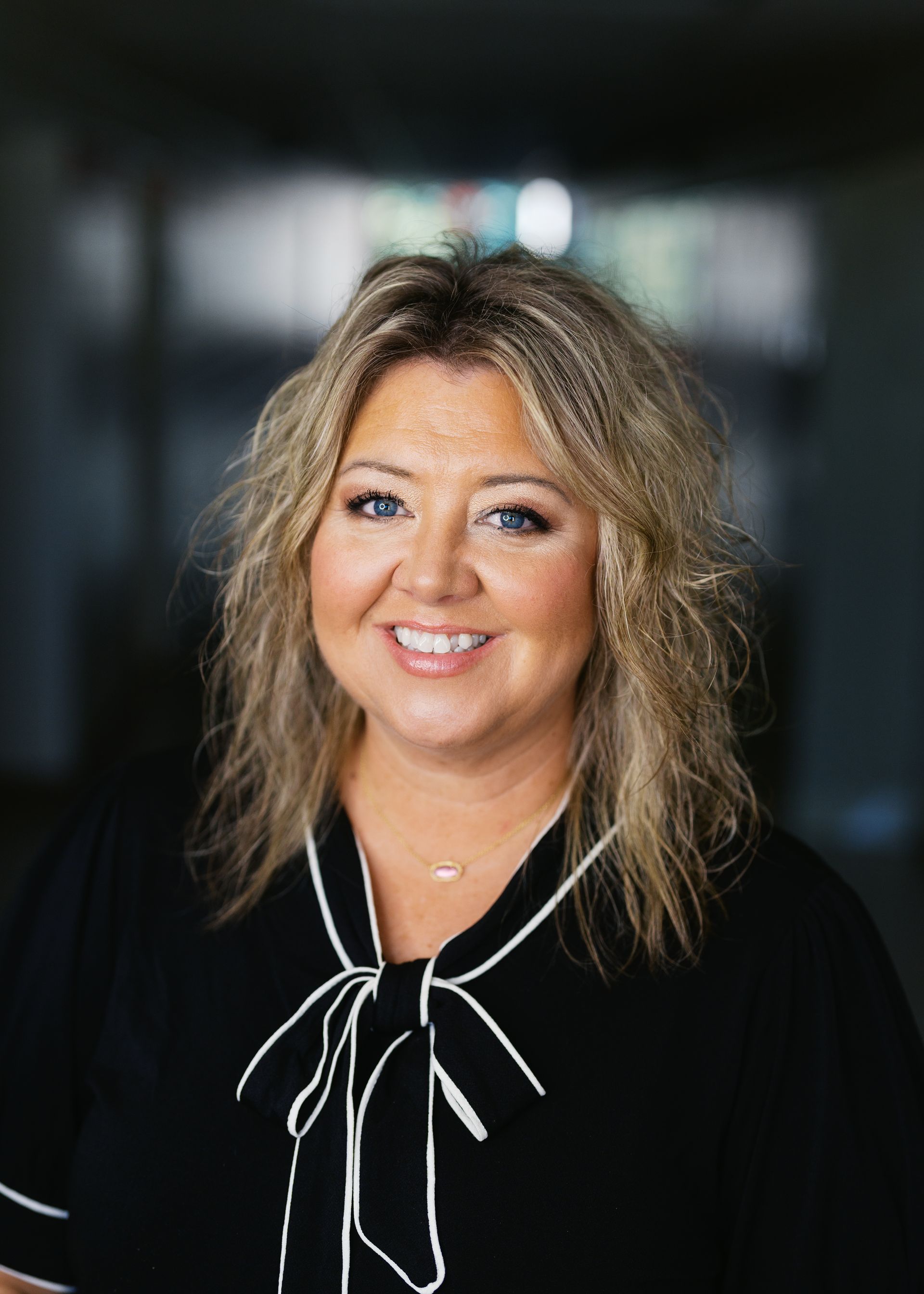 A silhouette of a person without a face on a white background.