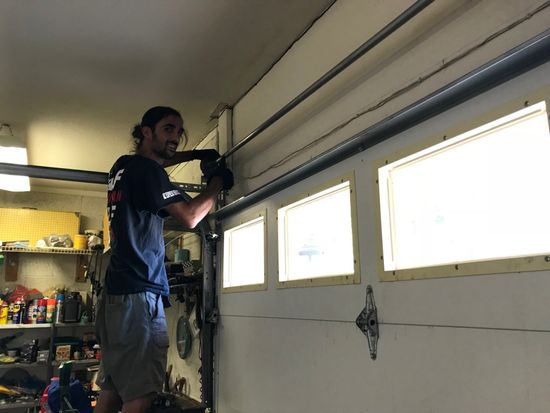 Scottsdale Arizona garage door professional replacing broken springs