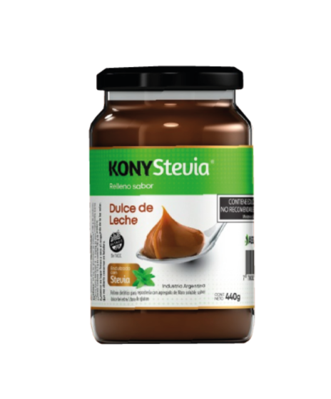 Un frasco de dulce de leche de konystevia sobre un fondo blanco.