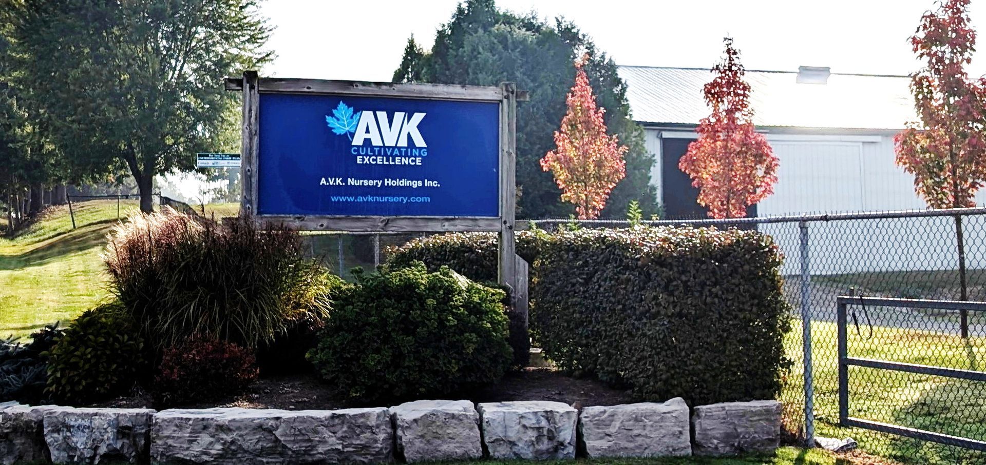 A blue awk sign is in front of a building