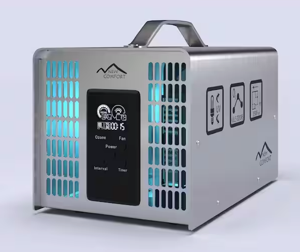 A portable air purifier with a handle is sitting on a white surface.