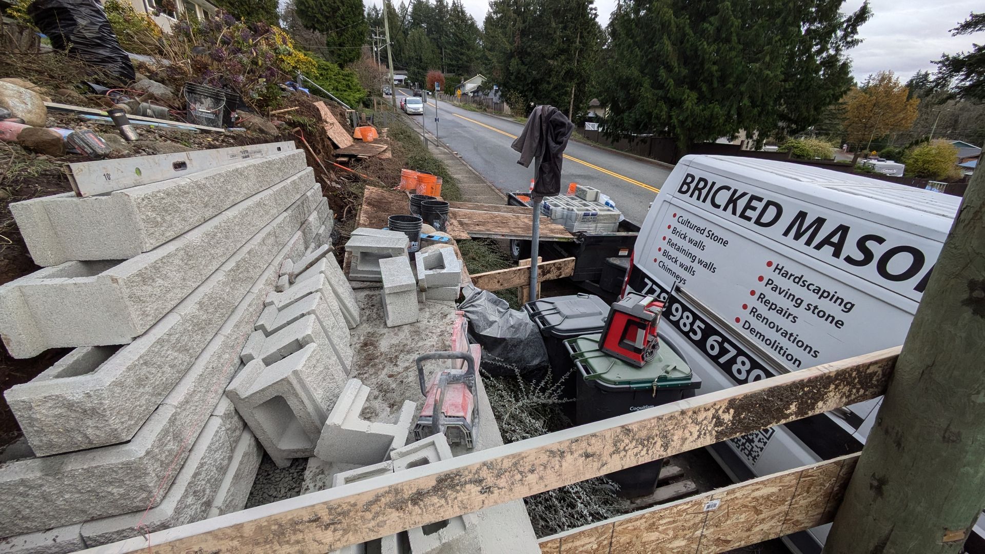 Bricked Masonry sprinter van unloading blocks for a retaining wall