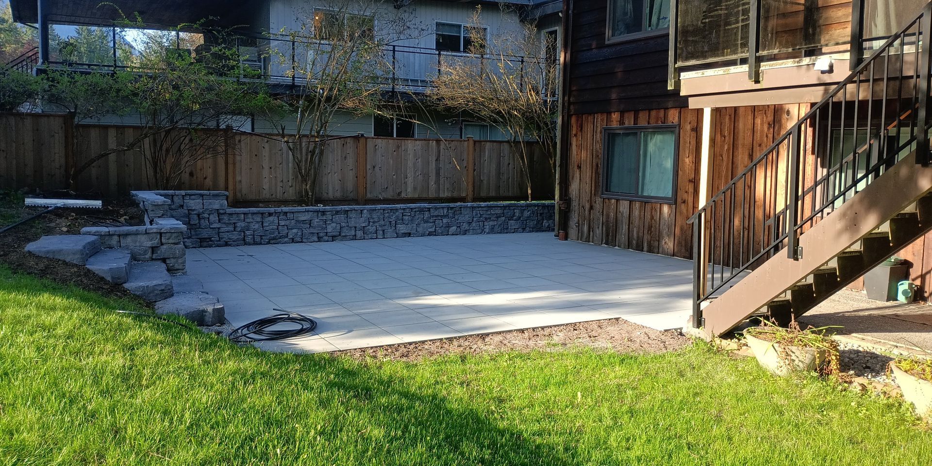 Freshly installed concrete slab patio sparking in the sun
