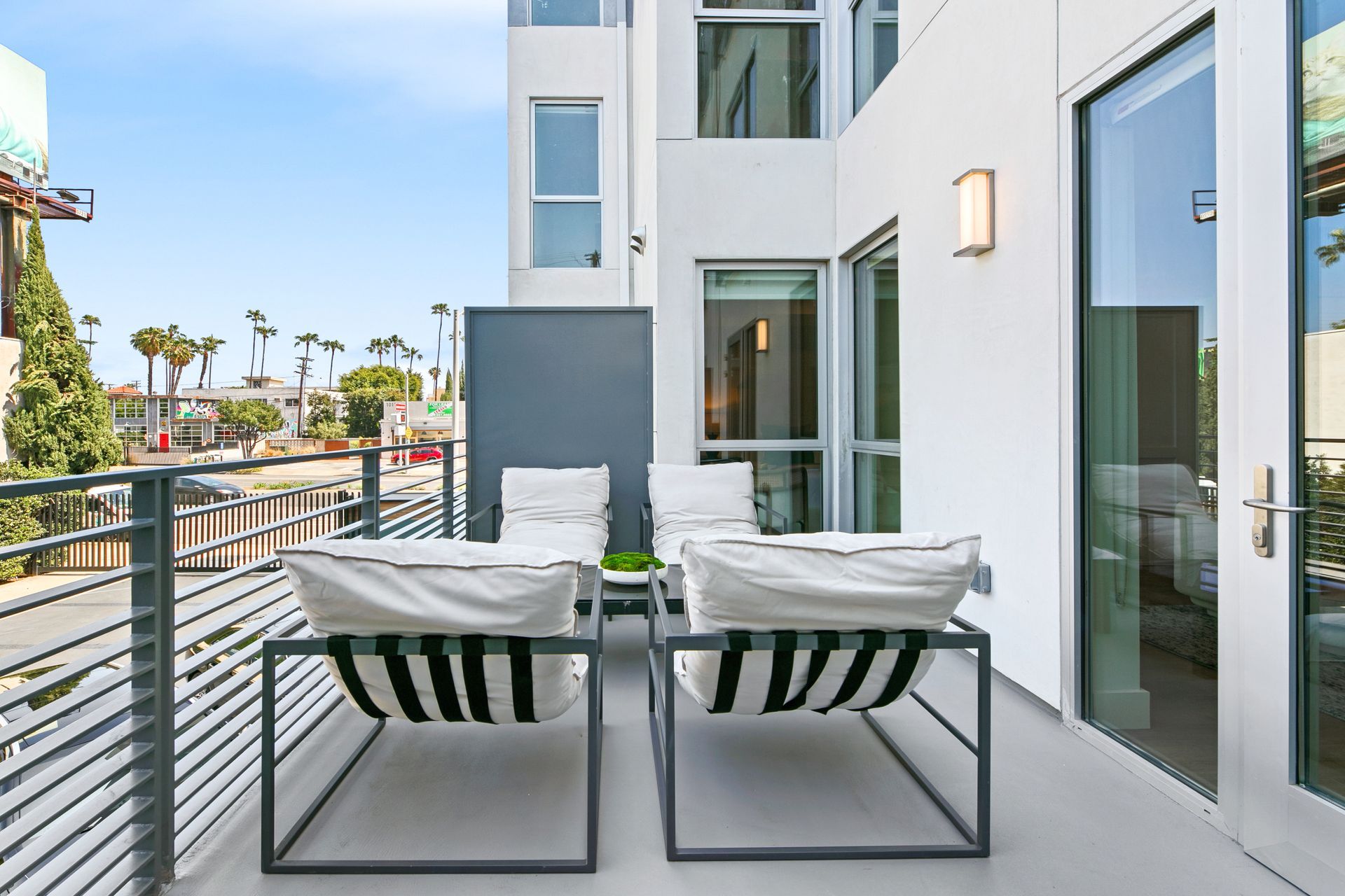 Photo of lounger chairs in an outdoor area