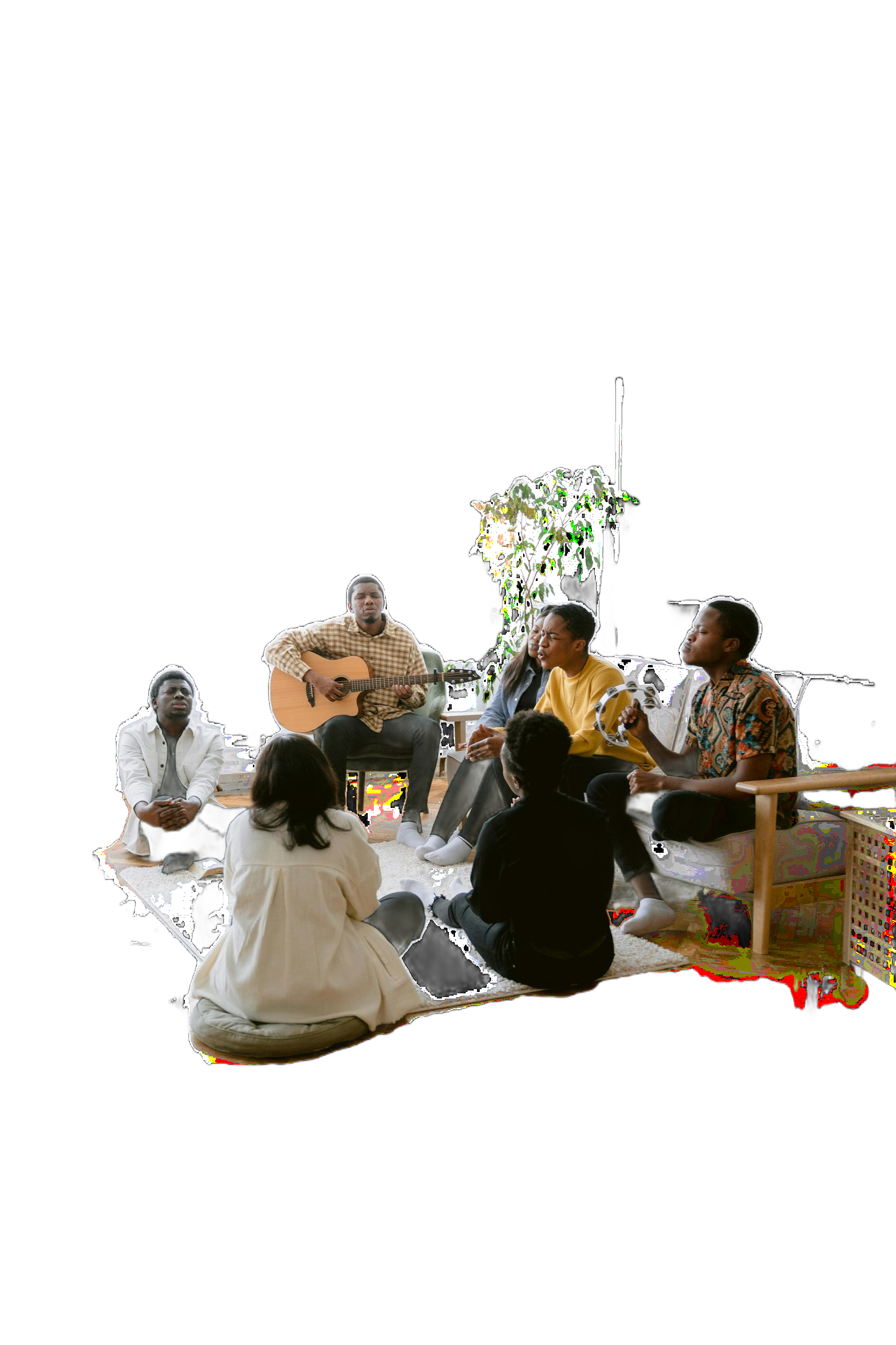 Musicians performing in a bright white studio, seated on the floor with guitars and a drum.