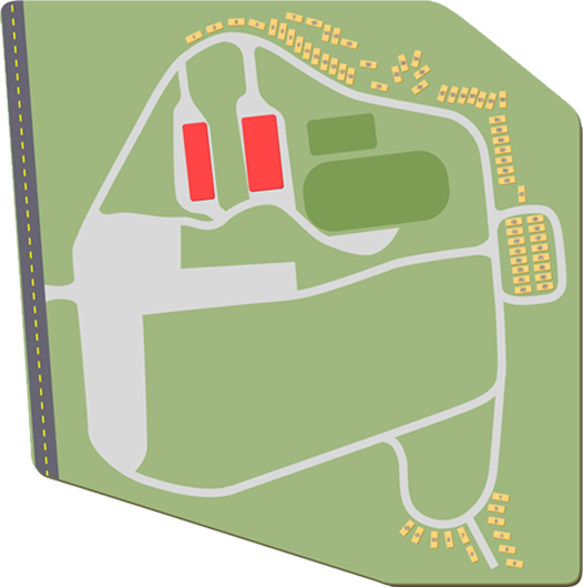Stylized airport map with runways, taxiways, terminals, and parking areas in green, gray, and red.