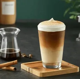A box of frosted latte is sitting on a wooden table