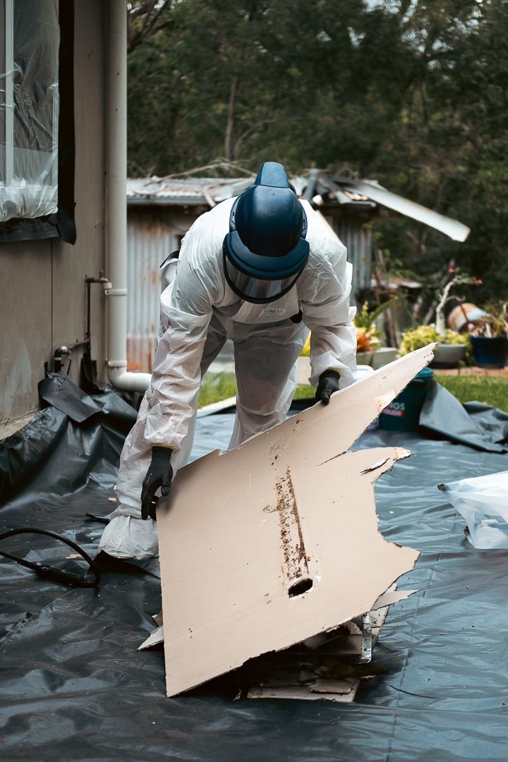 A House with A Carport and A Fence in Front of It — Asbestos Risk Removal In Rockhampton, QLD