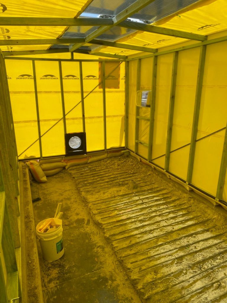 A House with A Yellow Seal Inside — Asbestos Risk Removal In Rockhampton, QLD