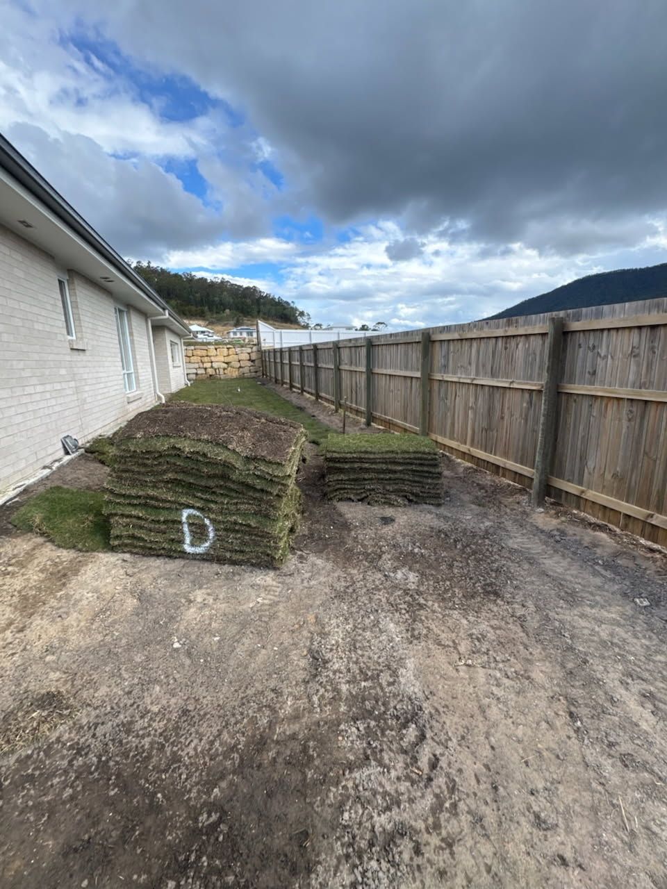 Stacks of Sod Are Ready for Installation — Coastline Earthworks in Helensvale, QLD