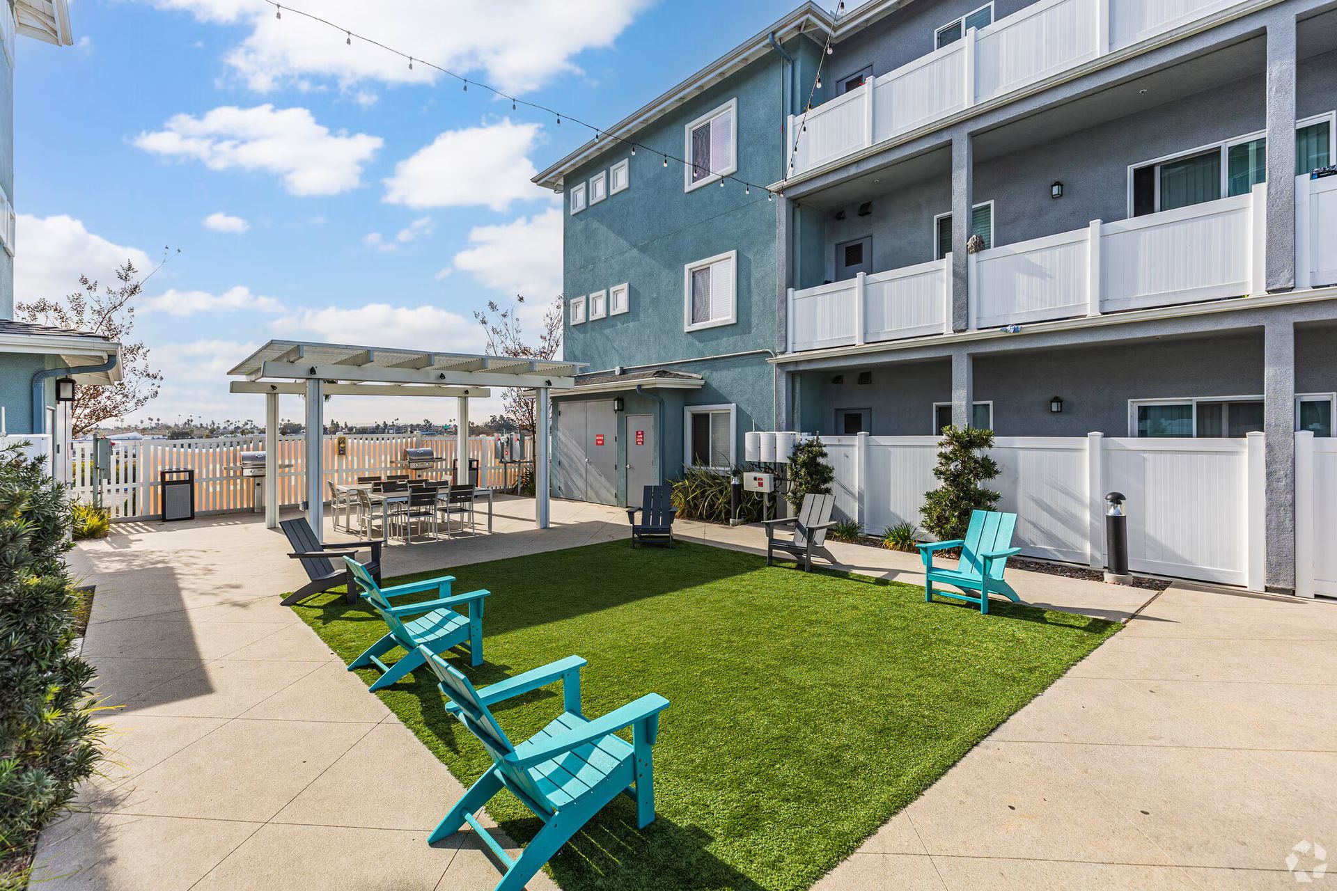 Photo showing a community outdoor lawn area