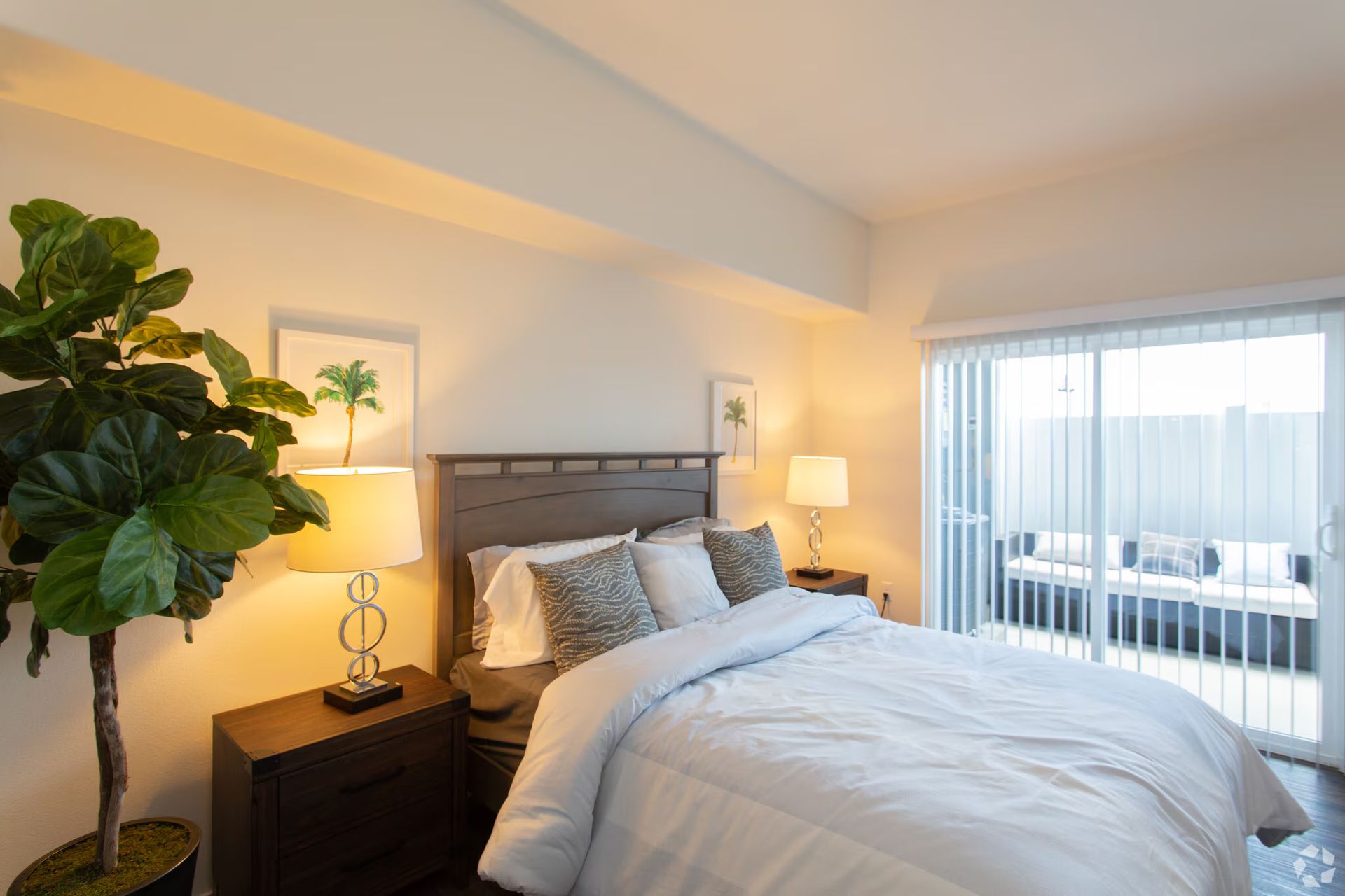 Photo showing a bedroom with a sliding glass window