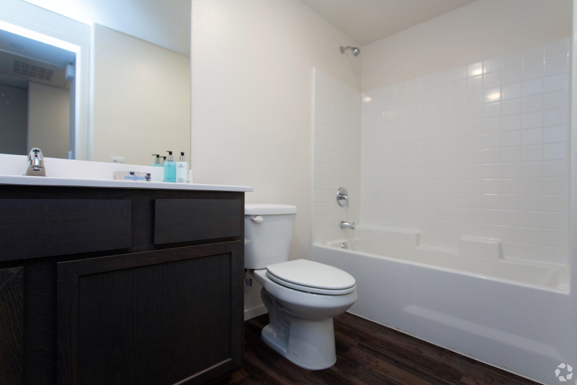 Photo showing a bathroom with a shower/tub combo