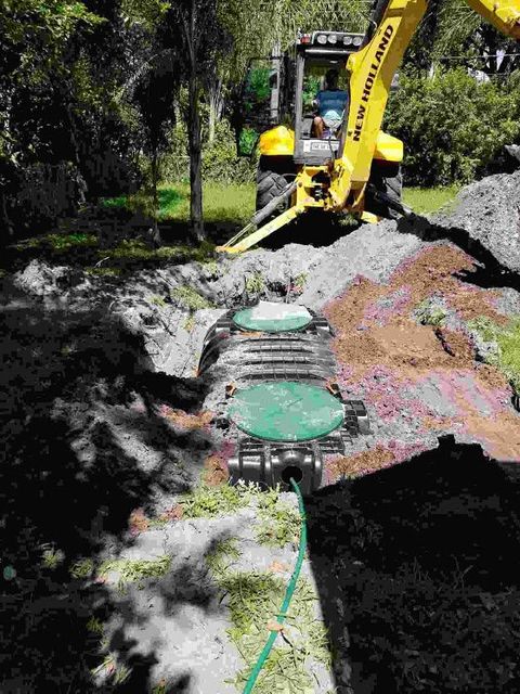 Sarasota Septic Servicing — Bulldozer Excavating for Septic Tank Installation in Sarasota, FL