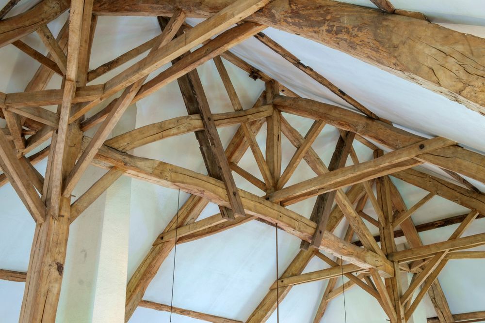 Wooden Beams Forming a Ceiling Structure — Premium Trusses In South Grafton, NSW