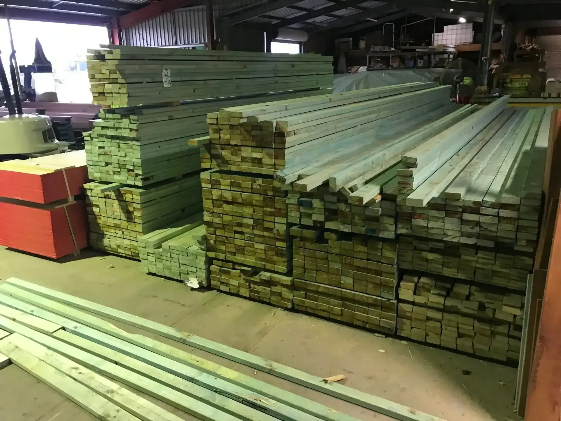 Stacks of Lumber in a Warehouse — Premium Trusses In South Grafton, NSW