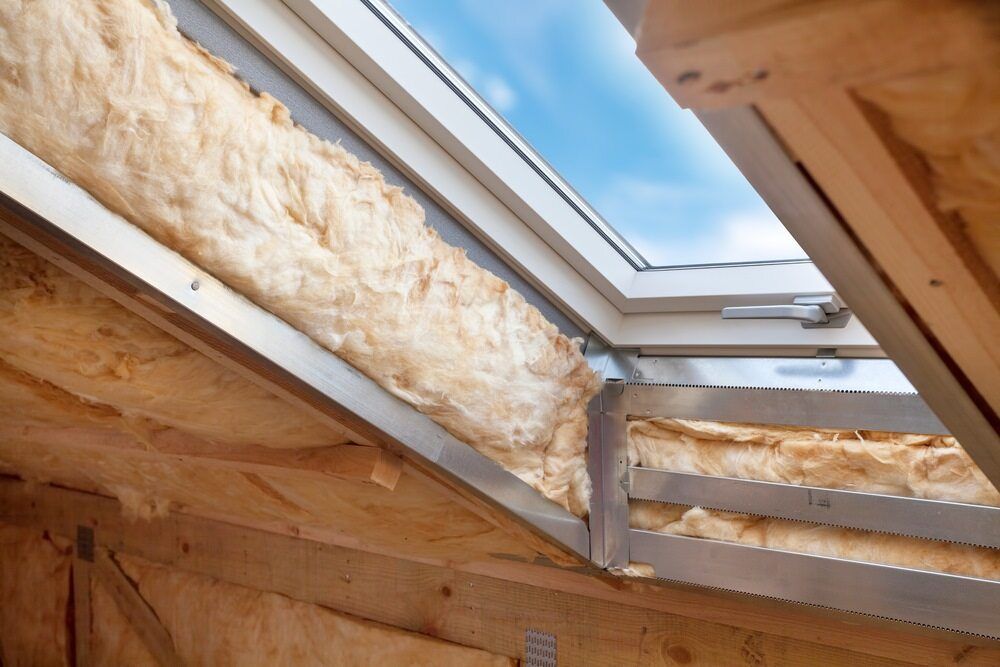 Interior View of a Skylight With Exposed Insulation and Wooden Framing — Premium Trusses In South Grafton, NSW