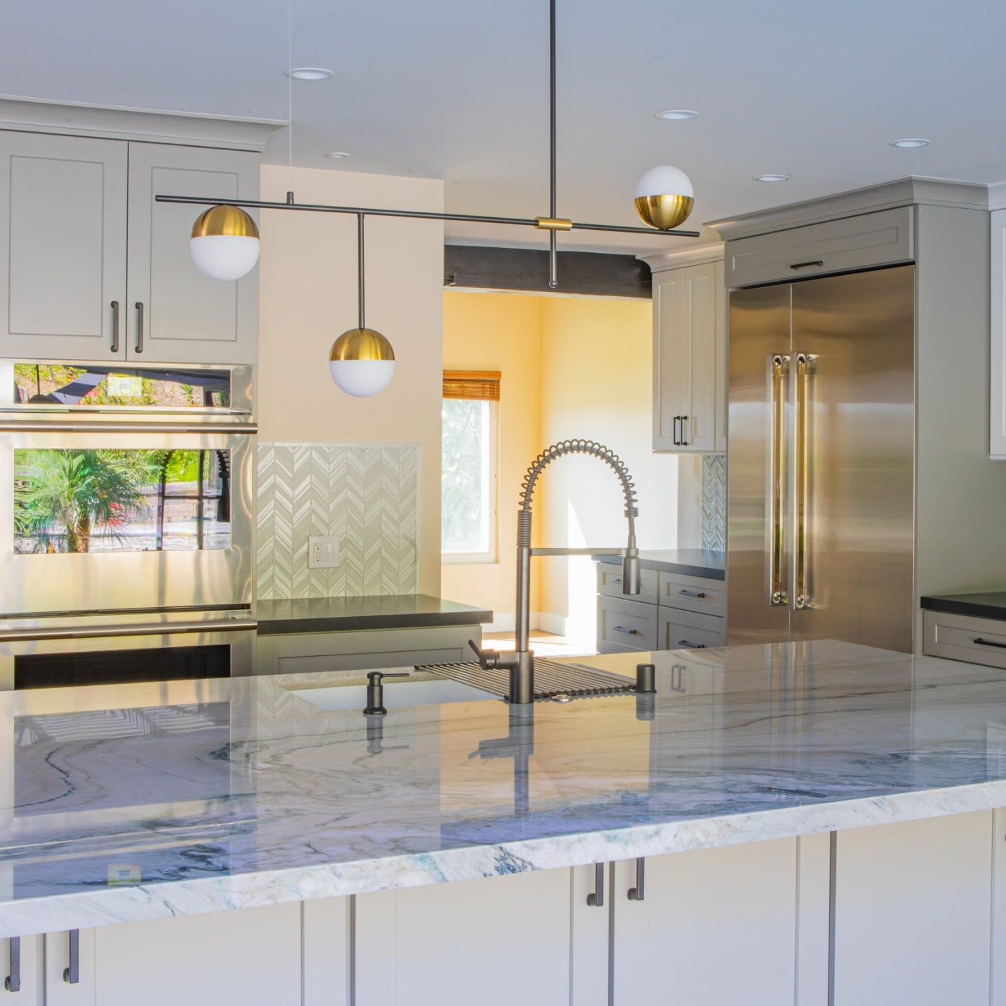 Black Cooktop and Granite Countertops