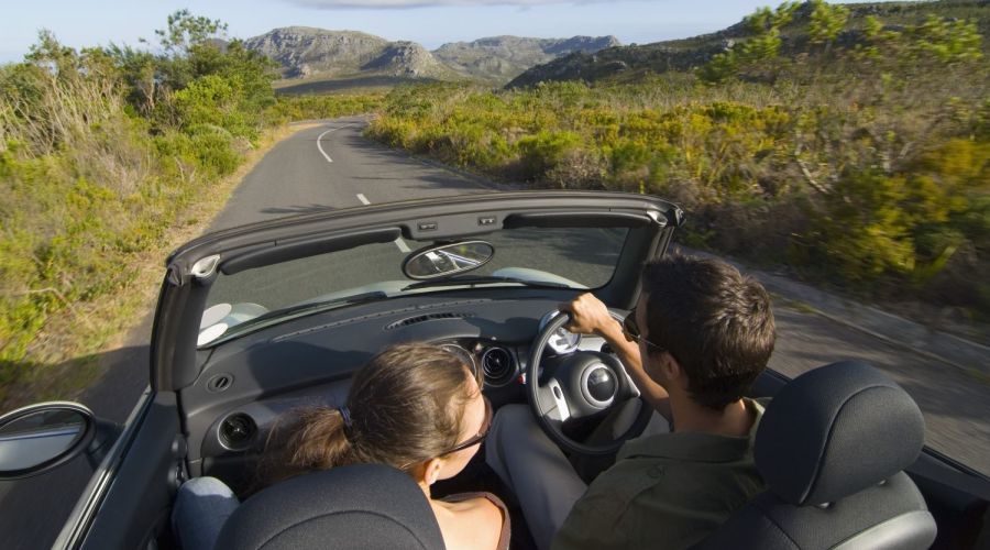 Couple driving from windscreen repair in Takanini