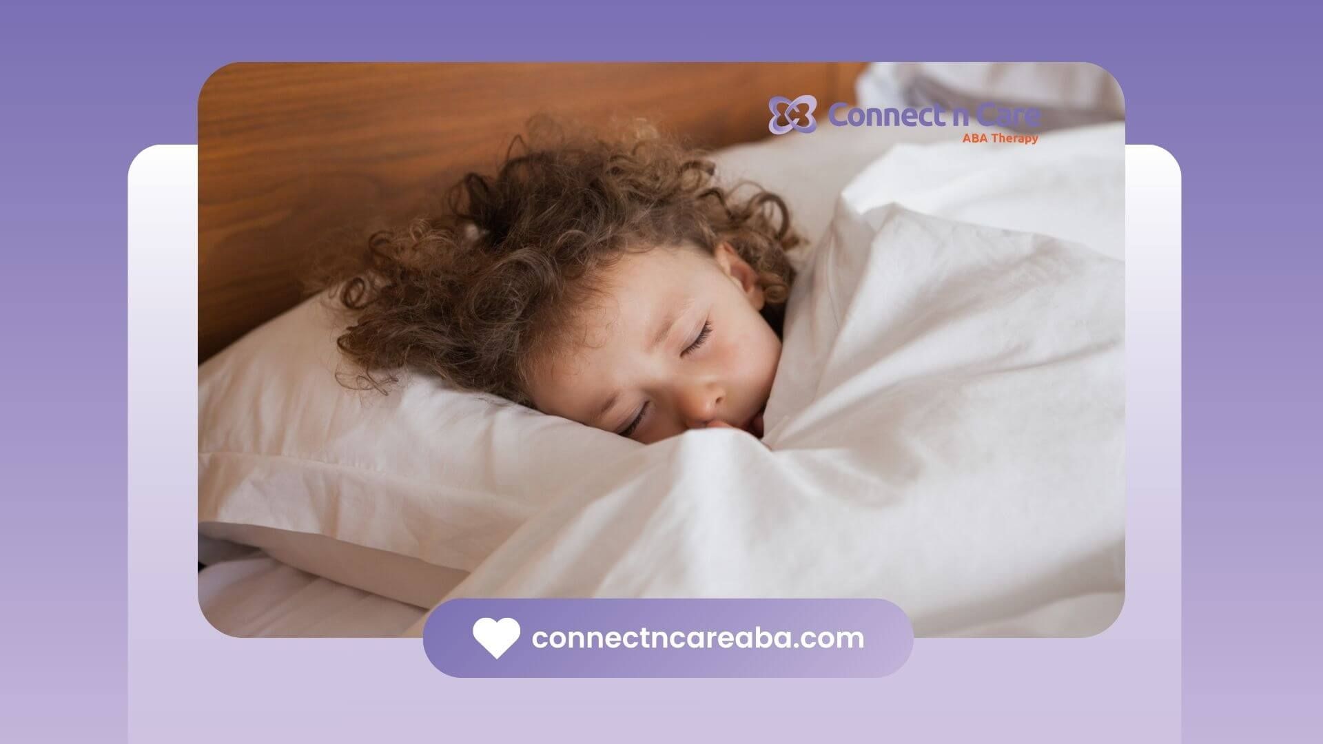 Peacefully sleeping child wrapped in white bedding after attending ABA therapy.