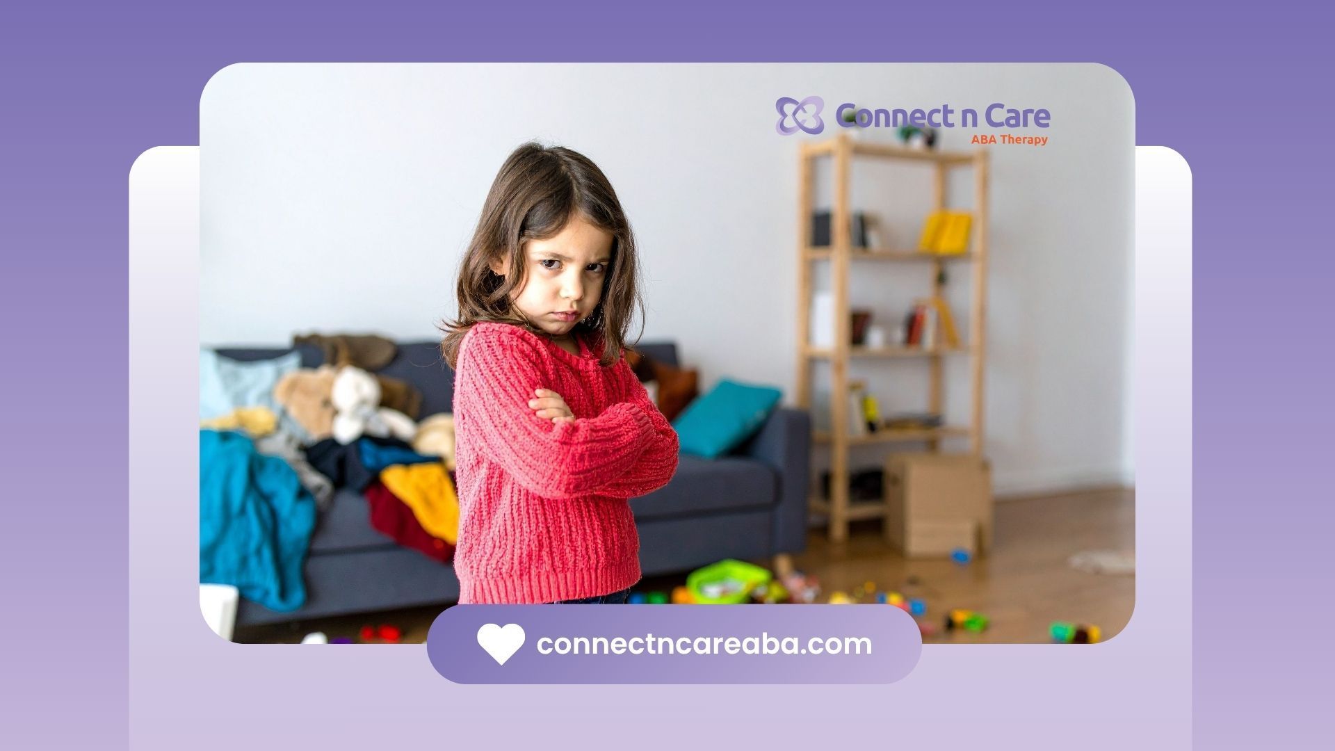 A young girl with arms crossed stands in a messy room, looking upset.