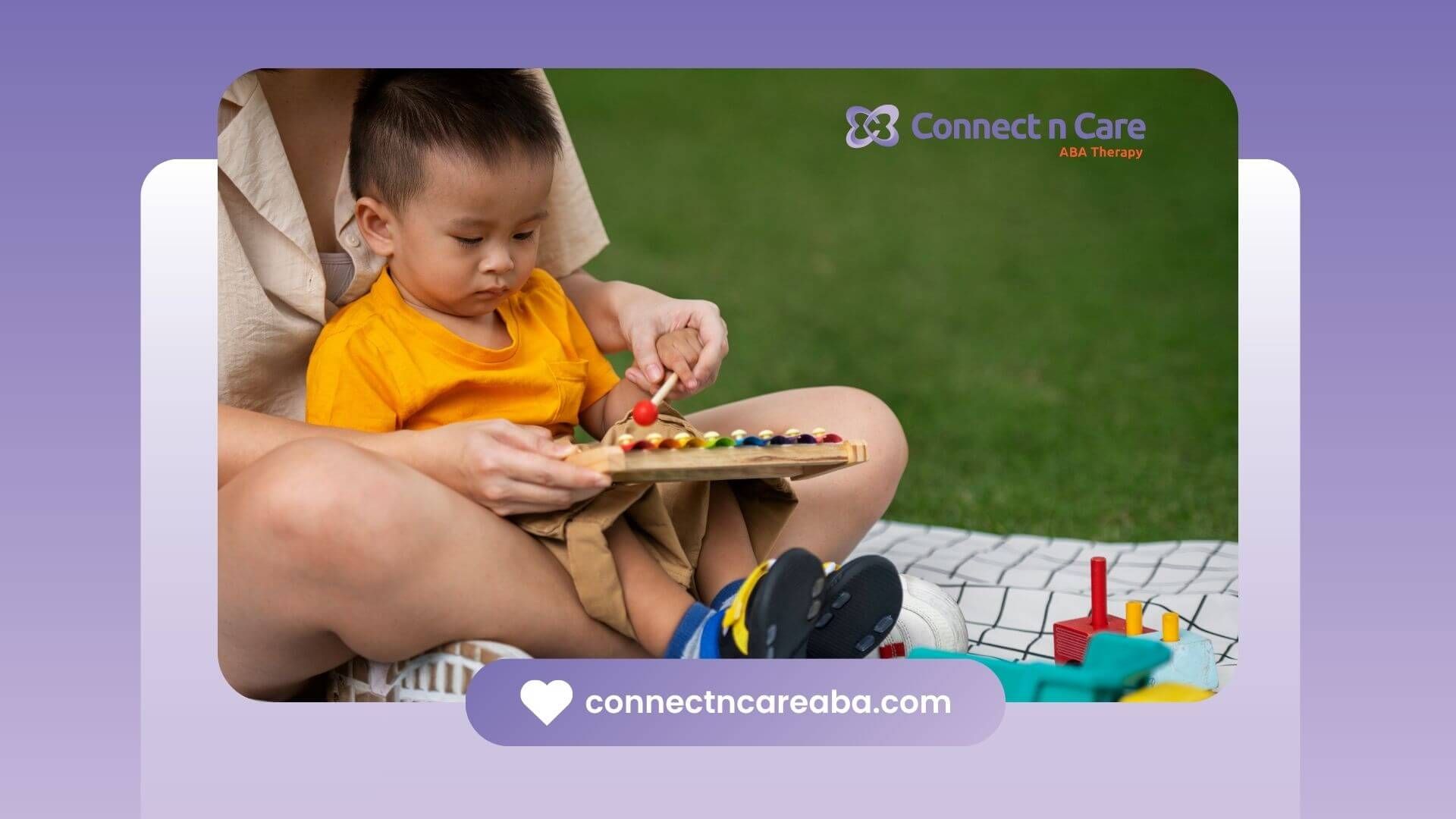 Therapist guiding autistic boy using wooden toy outdoors, supporting early ABA intervention
