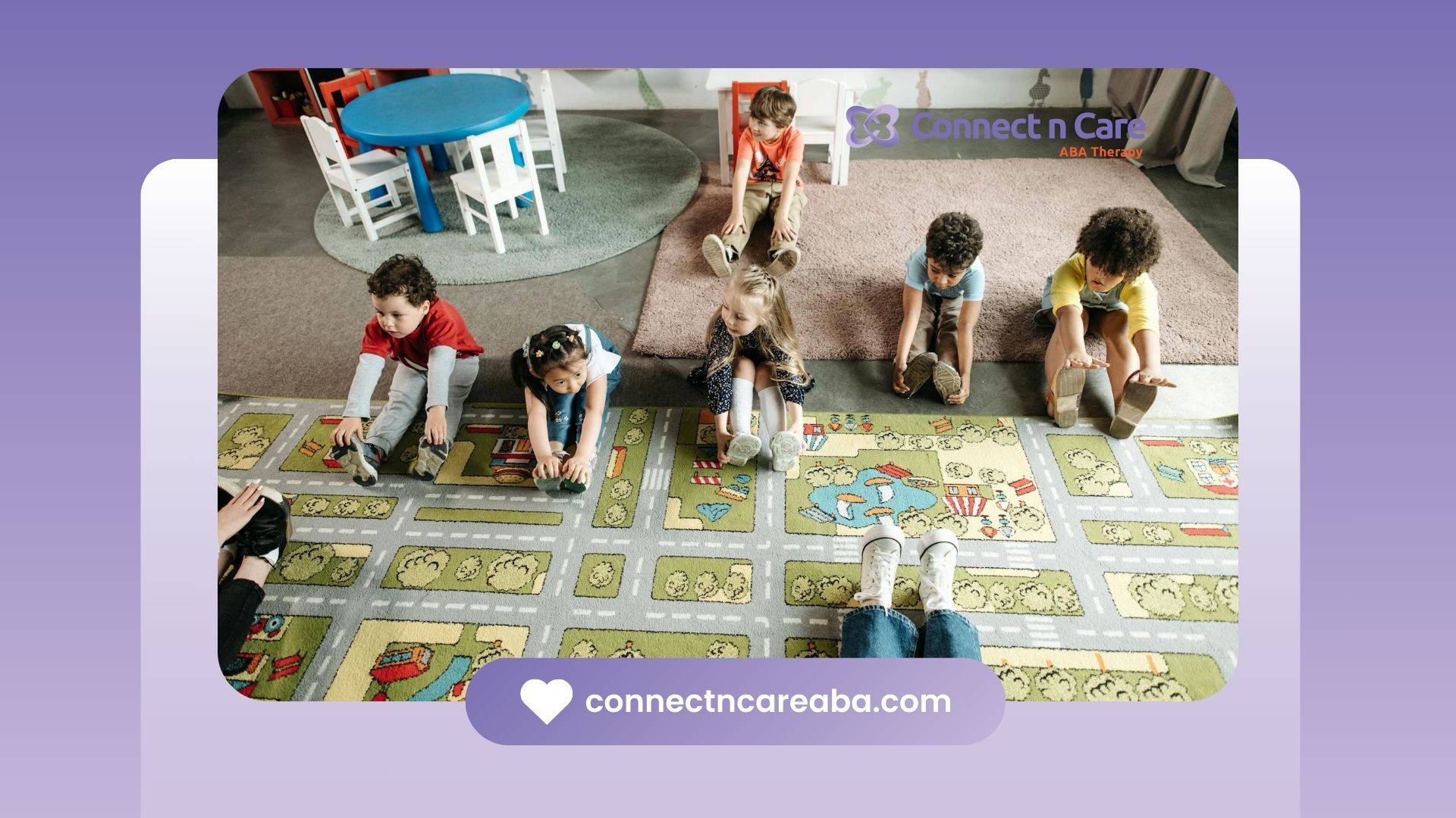 Group of young autistic children stretching on a colorful play mat during an ABA therapy in NC.