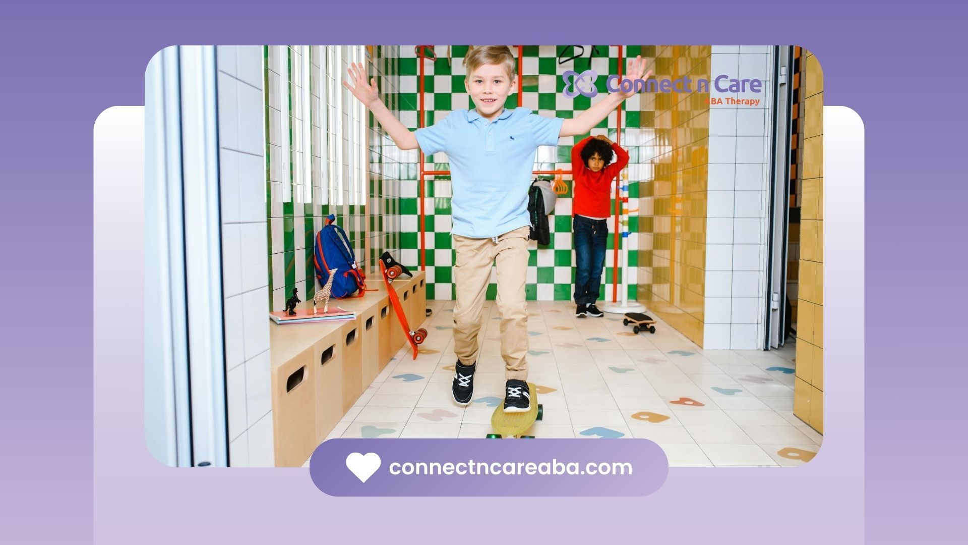 An autistic boy balancing on a skateboard at an indoor playroom in NC around a checkered wall.